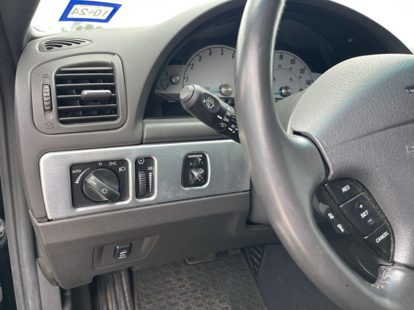 2002 BLACK FORD THUNDERBIRD (1FAHP60A82Y) , located at 4319 N Main St, Cleburne, TX, 76033, (817) 678-5133, 32.385960, -97.391212 - You will discover the appeal of the open road in this 2002 Ford Thunderbird 2-Door Convertible. It combines classic car design with modern performance. This iconic model, noted for its elegant lines and timeless grace, is in excellent condition and represents a collector's dream. The Thunderbird's - Photo#18