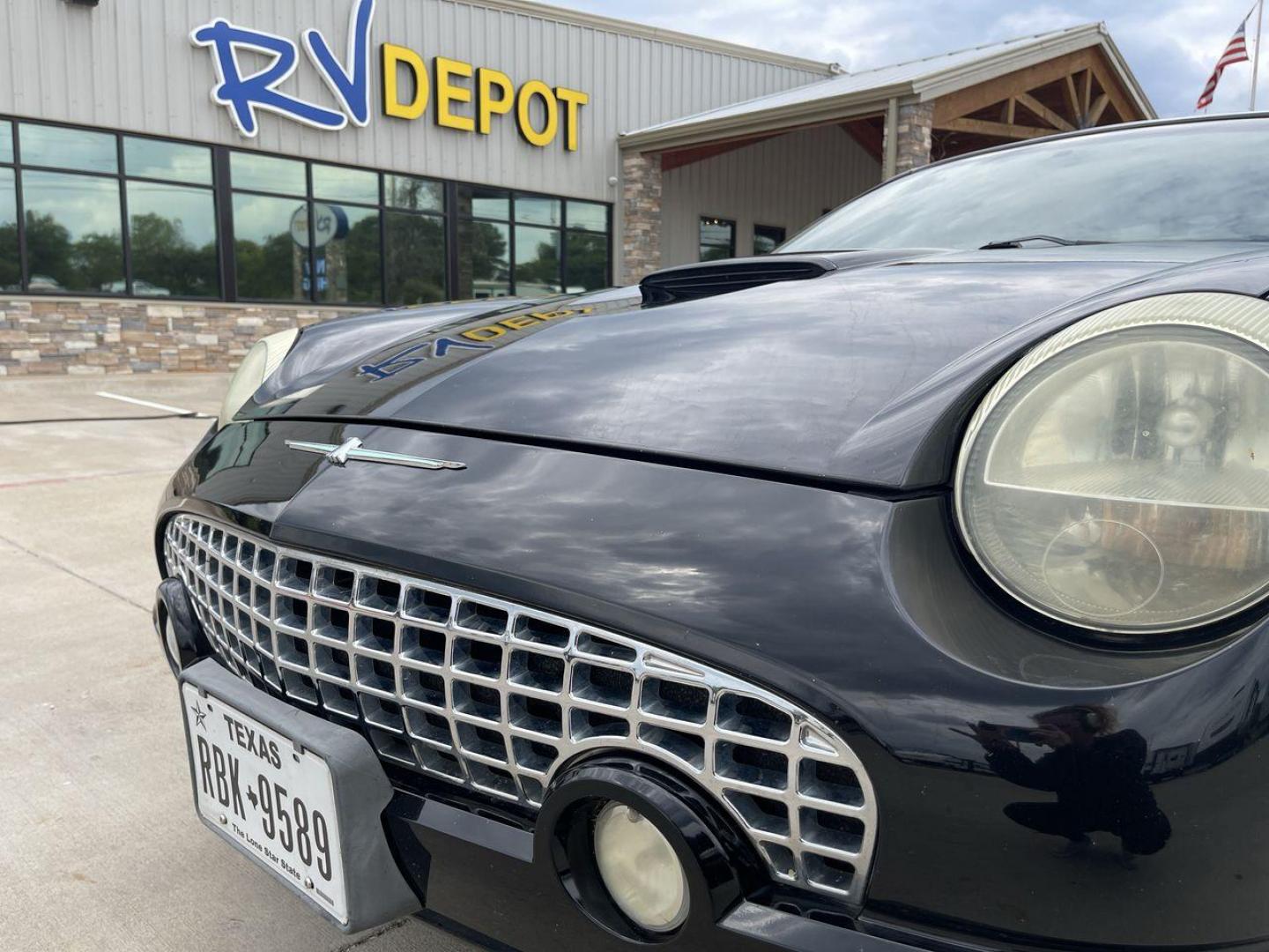 2002 BLACK FORD THUNDERBIRD (1FAHP60A82Y) , located at 4319 N Main St, Cleburne, TX, 76033, (817) 678-5133, 32.385960, -97.391212 - You will discover the appeal of the open road in this 2002 Ford Thunderbird 2-Door Convertible. It combines classic car design with modern performance. This iconic model, noted for its elegant lines and timeless grace, is in excellent condition and represents a collector's dream. The Thunderbird's - Photo#25