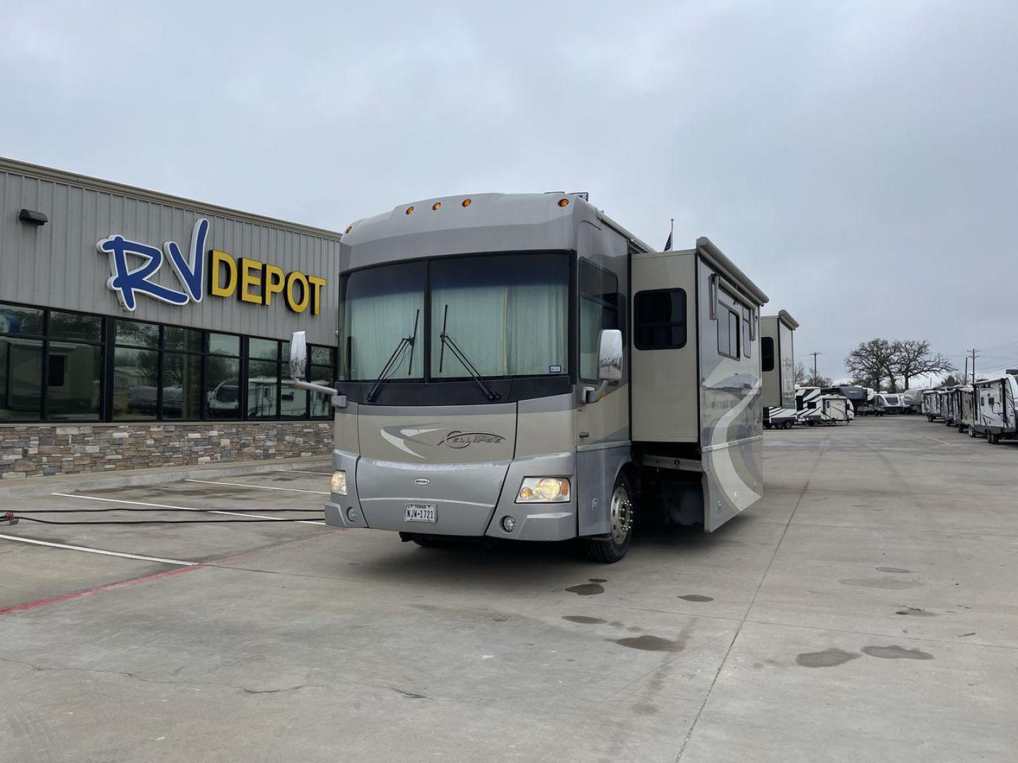 2006 BLUE ITASCA ELLIPSE 40FD - (4UZACKDC56C) , Length: 39 ft | Dry Weight: 32000 lbs | Gross Weight: 42000 lbs transmission, located at 4319 N Main St, Cleburne, TX, 76033, (817) 678-5133, 32.385960, -97.391212 - Here is the 2006 Itasca Ellipse 40FD, a top-of-the-line Class A motorhome designed for road trippers who want the ultimate in comfort and style. It is 39 feet long and weighs 32,000 pounds dry. The inside is very roomy and comfortable, making it perfect for long trips. The gross weight of this RV is - Photo#0