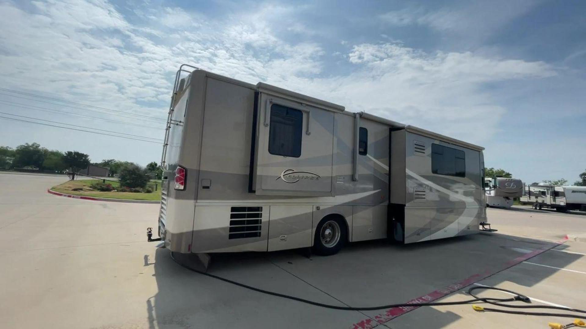 2006 BLUE ITASCA ELLIPSE 40FD - (4UZACKDC56C) , Length: 39 ft | Dry Weight: 32000 lbs | Gross Weight: 42000 lbs transmission, located at 4319 N Main St, Cleburne, TX, 76033, (817) 678-5133, 32.385960, -97.391212 - Here is the 2006 Itasca Ellipse 40FD, a top-of-the-line Class A motorhome designed for road trippers who want the ultimate in comfort and style. It is 39 feet long and weighs 32,000 pounds dry. The inside is very roomy and comfortable, making it perfect for long trips. The gross weight of this RV is - Photo#1