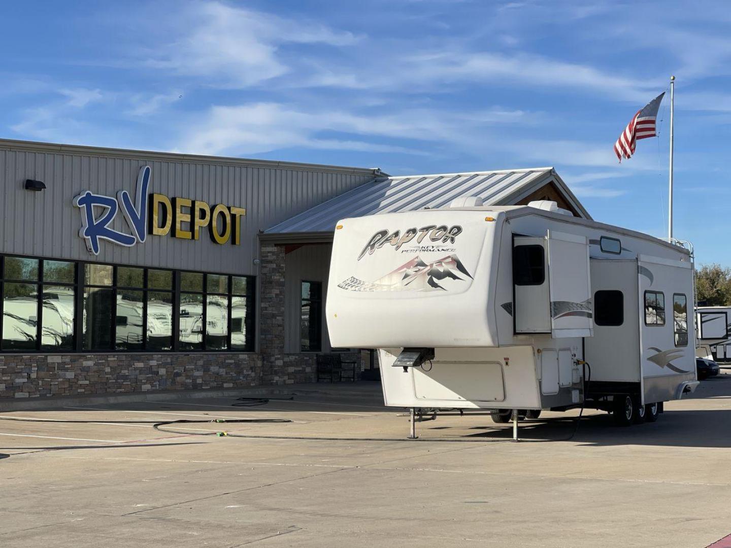 2006 KEYSTONE RAPTOR (4YDF361376M) , Length: 37.58 ft | Dry Weight: 11,615 lbs | Slides: 2 transmission, located at 4319 N Main St, Cleburne, TX, 76033, (817) 678-5133, 32.385960, -97.391212 - The 2016 Keystone Raptor RP3612 is a fifth-wheel toy hauler with a bold and functional exterior. It features a white body with stylish decals that include swooping lines and mountain graphics, giving it a sporty and adventurous look. The RV has three axles, offering stability and support for its lar - Photo#0