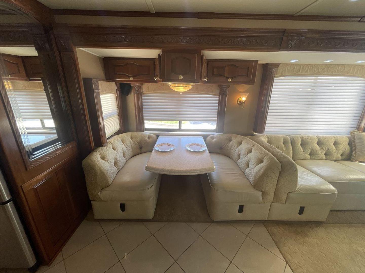 2006 TAN DES MONACO SIGNATURE COMMANDER (1RF17561561) , located at 4319 N Main St, Cleburne, TX, 76033, (817) 678-5133, 32.385960, -97.391212 - The 2006 Monaco Signature 45 is the ultimate in luxury and speed. It is a diesel pusher motorhome that oozes class and precision engineering. This 45-foot wonder shows how dedicated Monaco is to quality work and new ideas. The Signature 45 has a strong diesel engine and is well-built, so it has a sm - Photo#13