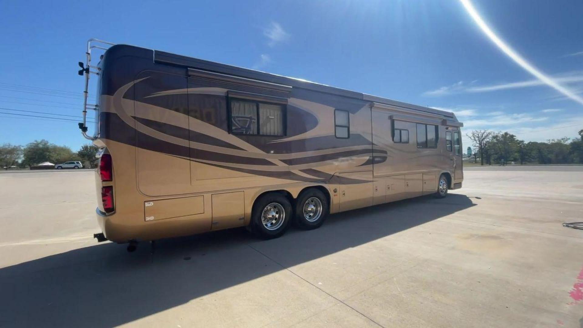 2006 TAN DES MONACO SIGNATURE COMMANDER (1RF17561561) , located at 4319 N Main St, Cleburne, TX, 76033, (817) 678-5133, 32.385960, -97.391212 - The 2006 Monaco Signature 45 is the ultimate in luxury and speed. It is a diesel pusher motorhome that oozes class and precision engineering. This 45-foot wonder shows how dedicated Monaco is to quality work and new ideas. The Signature 45 has a strong diesel engine and is well-built, so it has a sm - Photo#1