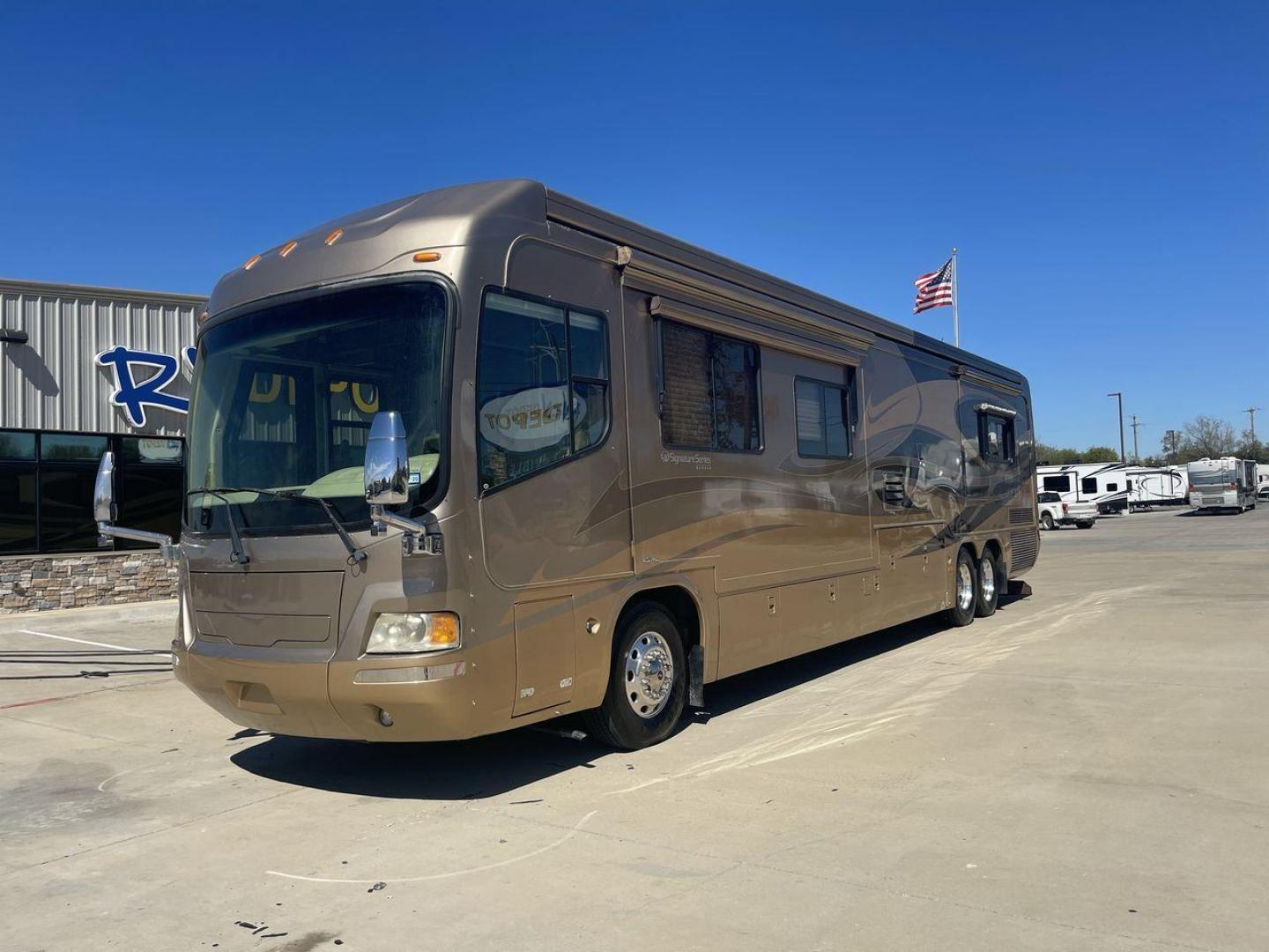 2006 TAN DES MONACO SIGNATURE COMMANDER (1RF17561561) , located at 4319 N Main St, Cleburne, TX, 76033, (817) 678-5133, 32.385960, -97.391212 - The 2006 Monaco Signature 45 is the ultimate in luxury and speed. It is a diesel pusher motorhome that oozes class and precision engineering. This 45-foot wonder shows how dedicated Monaco is to quality work and new ideas. The Signature 45 has a strong diesel engine and is well-built, so it has a sm - Photo#20