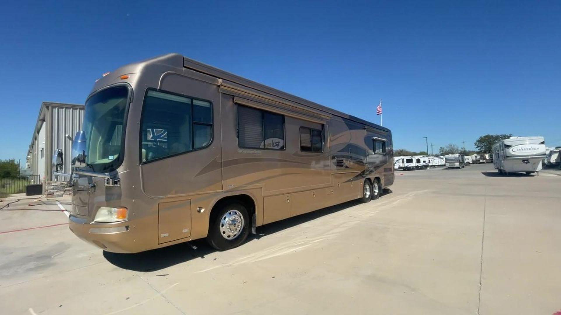 2006 TAN DES MONACO SIGNATURE COMMANDER (1RF17561561) , located at 4319 N Main St, Cleburne, TX, 76033, (817) 678-5133, 32.385960, -97.391212 - The 2006 Monaco Signature 45 is the ultimate in luxury and speed. It is a diesel pusher motorhome that oozes class and precision engineering. This 45-foot wonder shows how dedicated Monaco is to quality work and new ideas. The Signature 45 has a strong diesel engine and is well-built, so it has a sm - Photo#5