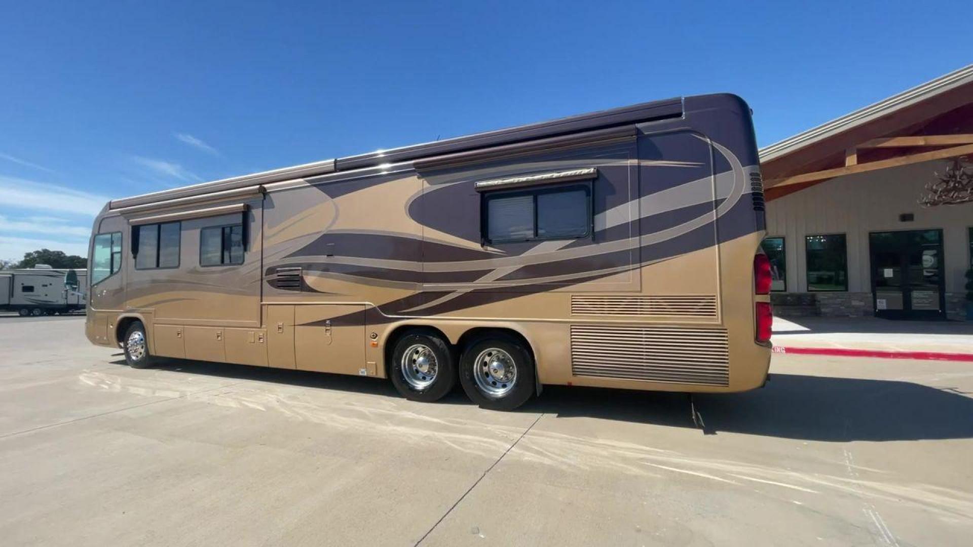 2006 TAN DES MONACO SIGNATURE COMMANDER (1RF17561561) , located at 4319 N Main St, Cleburne, TX, 76033, (817) 678-5133, 32.385960, -97.391212 - The 2006 Monaco Signature 45 is the ultimate in luxury and speed. It is a diesel pusher motorhome that oozes class and precision engineering. This 45-foot wonder shows how dedicated Monaco is to quality work and new ideas. The Signature 45 has a strong diesel engine and is well-built, so it has a sm - Photo#7