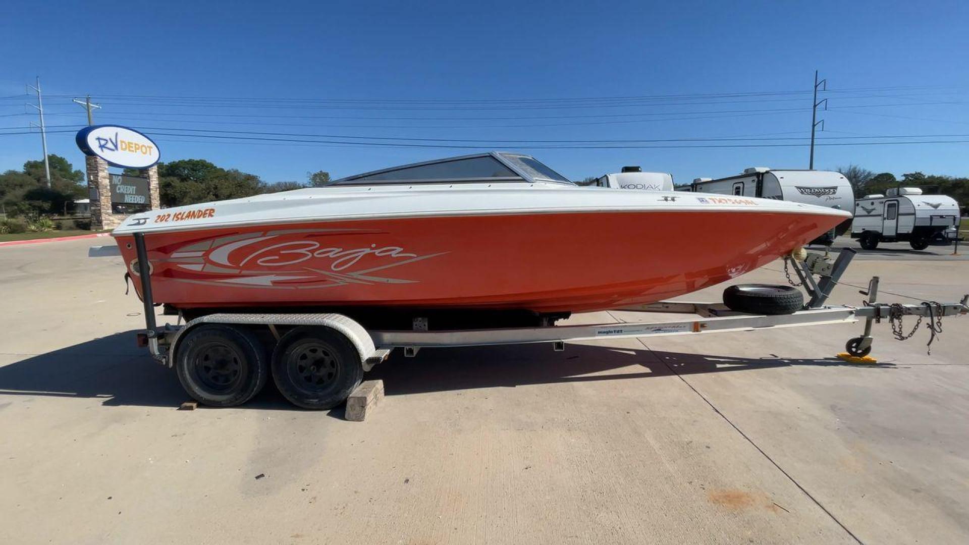 2007 ORANGE BAJA ISLANDER 202 (AGC47079A70) , Length: 21.92 ft. transmission, located at 4319 N Main St, Cleburne, TX, 76033, (817) 678-5133, 32.385960, -97.391212 - The 2007 Baja Islander 202 is an exciting boat that's great for people who want to have fun on the water. It is great for traveling, water sports, and fishing because it looks good and moves quickly. The Islander 202 is a small but useful 20 feet boat that is easy to move and tow, which makes it a g - Photo#2