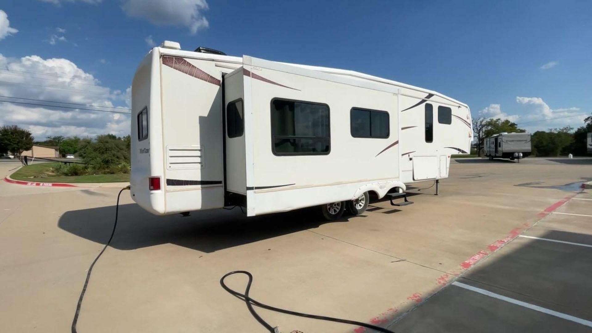 2007 WHITE MONTANA 3585SA (4YDF3582274) , Length: 38.33 ft. | Dry Weight: 11,555 lbs. | Slides: 3 transmission, located at 4319 N Main St, Cleburne, TX, 76033, (817) 678-5133, 32.385960, -97.391212 - The 2007 Montana 3585SA fifth wheel provides every family with the best overall features so that you can rest and enjoy an excellent camping experience. This fifth wheel measures 38.33 ft in length, 8 ft in width, and 12.75 ft in height. It has a dry weight of 11,555 lbs., a payload capacity of 4,02 - Photo#1