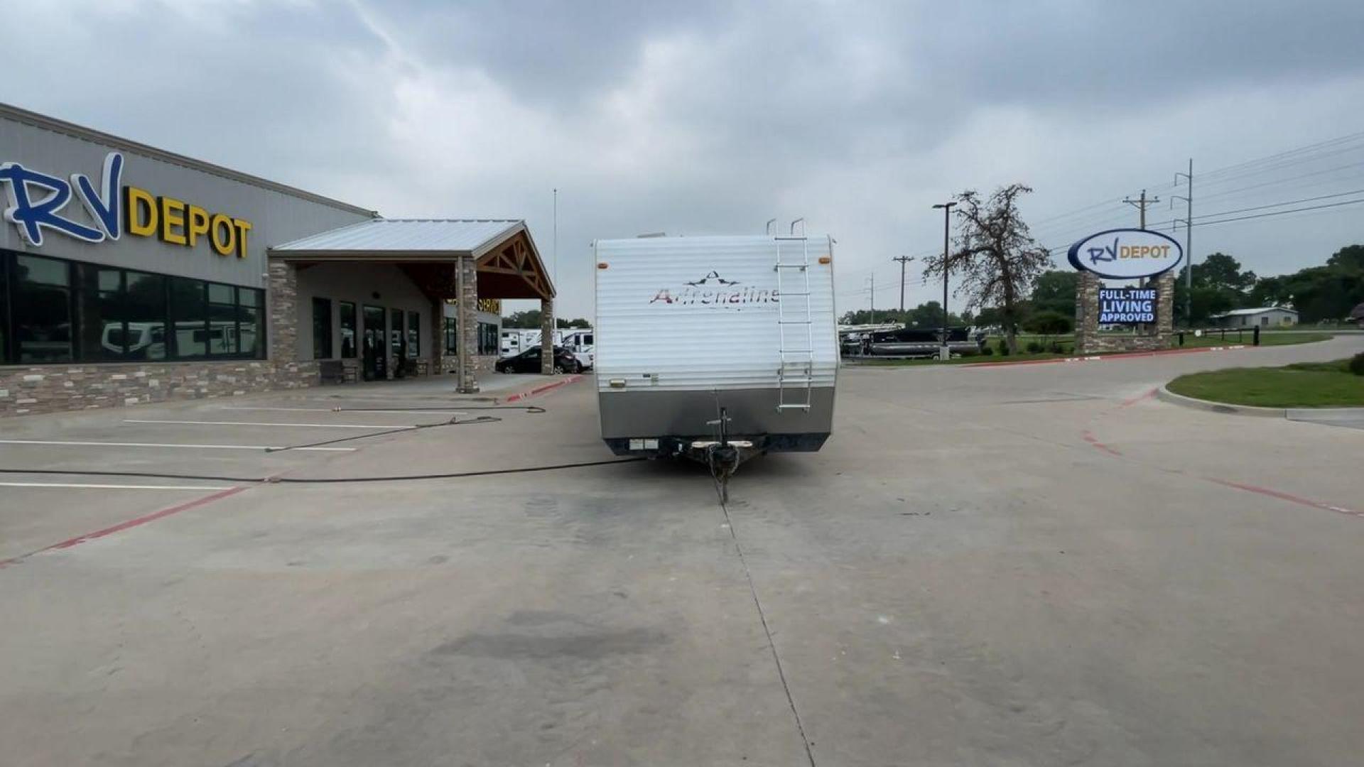 2008 WHITE ADRENALINE 23FS (1TC2B180683) , Length: 28.67 ft | Dry Weight: 6,474 lbs | Gross Weight: 9,500 lbs | Slides: 9 transmission, located at 4319 N Main St, Cleburne, TX, 76033, (817) 678-5133, 32.385960, -97.391212 - The 2008 Adrenaline 23FS Toy Hauler is prepared for a journey! It is 28.67 feet long and weighs 6,474 pounds when dry. It's lightweight and portable, but large enough to hold all of your favorite toys and accessories. It can accommodate up to 9,500 pounds, so you'll have plenty of room for your next - Photo#4