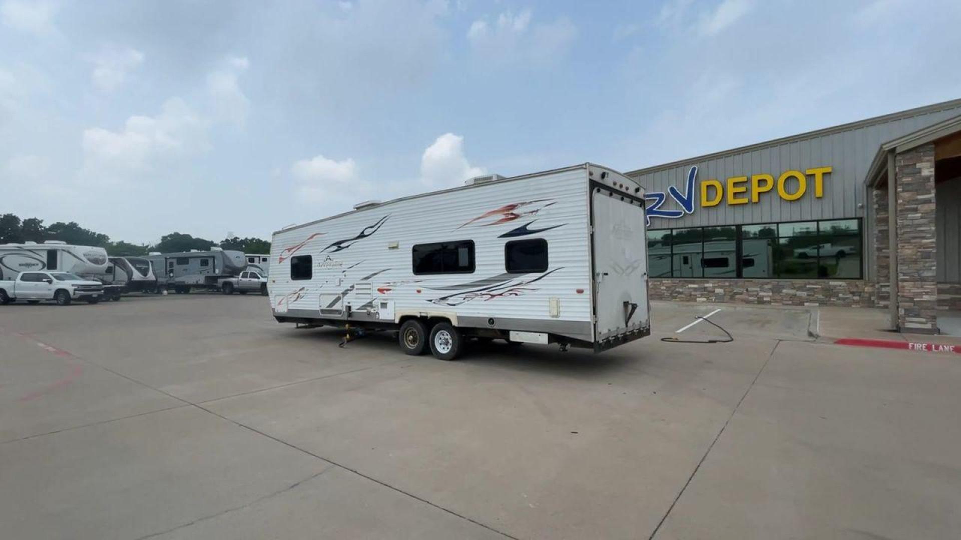 2008 WHITE ADRENALINE 23FS (1TC2B180683) , Length: 28.67 ft | Dry Weight: 6,474 lbs | Gross Weight: 9,500 lbs | Slides: 9 transmission, located at 4319 N Main St, Cleburne, TX, 76033, (817) 678-5133, 32.385960, -97.391212 - The 2008 Adrenaline 23FS Toy Hauler is prepared for a journey! It is 28.67 feet long and weighs 6,474 pounds when dry. It's lightweight and portable, but large enough to hold all of your favorite toys and accessories. It can accommodate up to 9,500 pounds, so you'll have plenty of room for your next - Photo#7