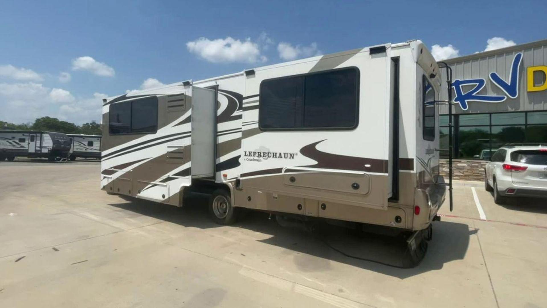 2008 TAN COACHMEN LEPRECHAUN 320DS E-450 (1FDXE45S08D) with an 6.8L V10 SOHC 20V engine, Length: 31.5 ft. | Dry Weight: 12,555 lbs. | Gross Weight: 14,500 lbs. | Slides: 2 transmission, located at 4319 N Main St, Cleburne, TX, 76033, (817) 678-5133, 32.385960, -97.391212 - The 2008 Coachmen Leprechaun 320DS is a Class C motorhome with a compact design of 31.5-foot length. It is designed to ease your travels without compromising on space or amenities. With a substantial dry weight of 12,555 lbs and a gross weight capacity of 14,500 lbs, it is built to handle all your t - Photo#1