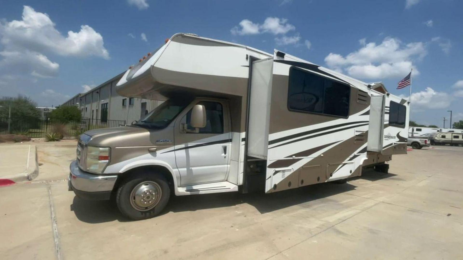 2008 TAN COACHMEN LEPRECHAUN 320DS E-450 (1FDXE45S08D) with an 6.8L V10 SOHC 20V engine, Length: 31.5 ft. | Dry Weight: 12,555 lbs. | Gross Weight: 14,500 lbs. | Slides: 2 transmission, located at 4319 N Main St, Cleburne, TX, 76033, (817) 678-5133, 32.385960, -97.391212 - The 2008 Coachmen Leprechaun 320DS is a Class C motorhome with a compact design of 31.5-foot length. It is designed to ease your travels without compromising on space or amenities. With a substantial dry weight of 12,555 lbs and a gross weight capacity of 14,500 lbs, it is built to handle all your t - Photo#3