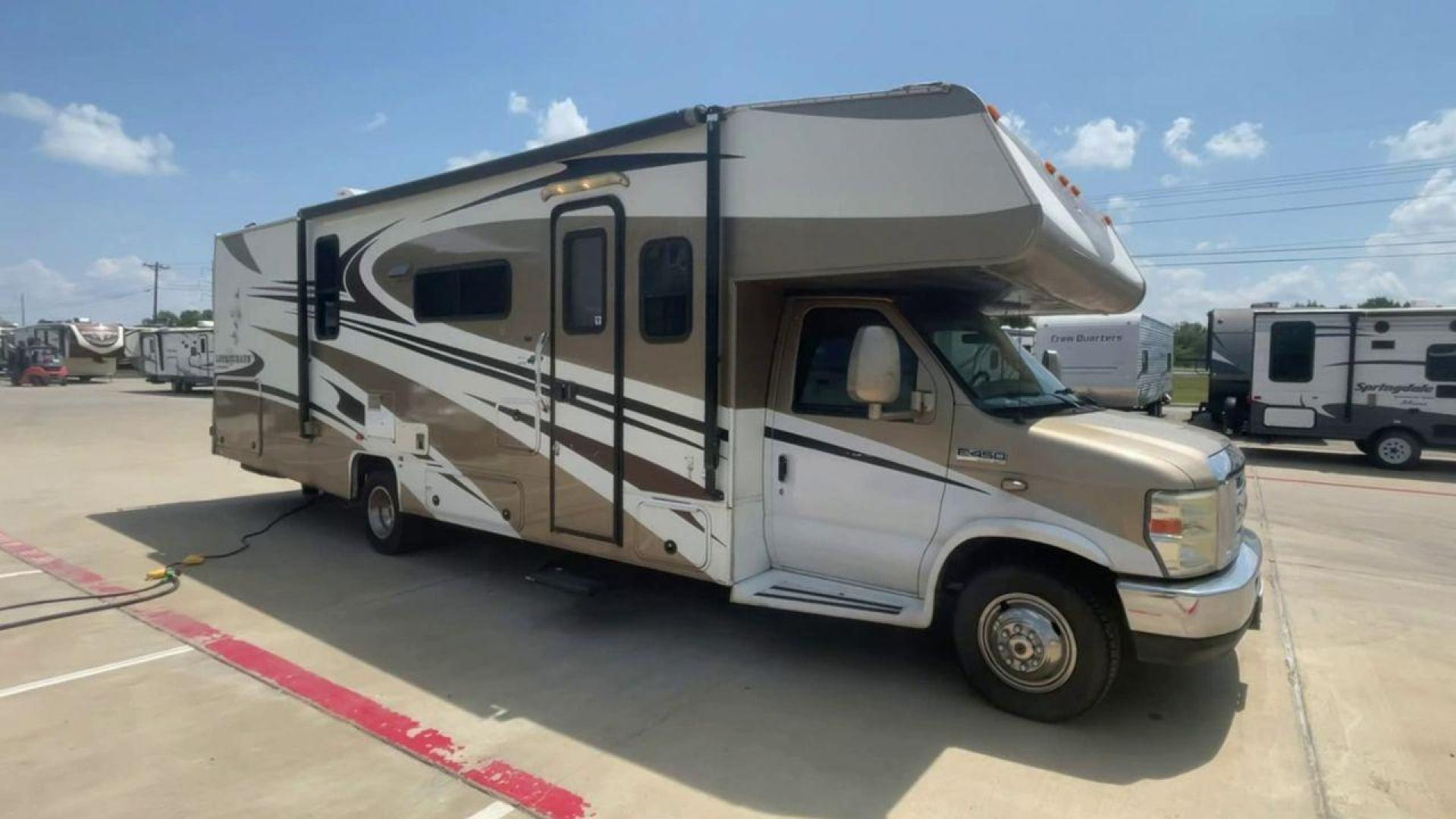 2008 TAN COACHMEN LEPRECHAUN 320DS E-450 (1FDXE45S08D) with an 6.8L V10 SOHC 20V engine, Length: 31.5 ft. | Dry Weight: 12,555 lbs. | Gross Weight: 14,500 lbs. | Slides: 2 transmission, located at 4319 N Main St, Cleburne, TX, 76033, (817) 678-5133, 32.385960, -97.391212 - The 2008 Coachmen Leprechaun 320DS is a Class C motorhome with a compact design of 31.5-foot length. It is designed to ease your travels without compromising on space or amenities. With a substantial dry weight of 12,555 lbs and a gross weight capacity of 14,500 lbs, it is built to handle all your t - Photo#5