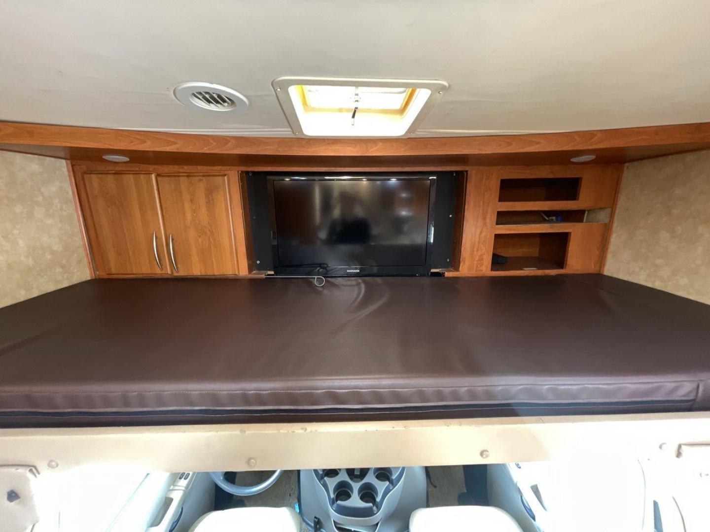 2008 TAN COACHMEN LEPRECHAUN 320DS E-450 (1FDXE45S08D) with an 6.8L V10 SOHC 20V engine, Length: 31.5 ft. | Dry Weight: 12,555 lbs. | Gross Weight: 14,500 lbs. | Slides: 2 transmission, located at 4319 N Main St, Cleburne, TX, 76033, (817) 678-5133, 32.385960, -97.391212 - The 2008 Coachmen Leprechaun 320DS is a Class C motorhome with a compact design of 31.5-foot length. It is designed to ease your travels without compromising on space or amenities. With a substantial dry weight of 12,555 lbs and a gross weight capacity of 14,500 lbs, it is built to handle all your t - Photo#19