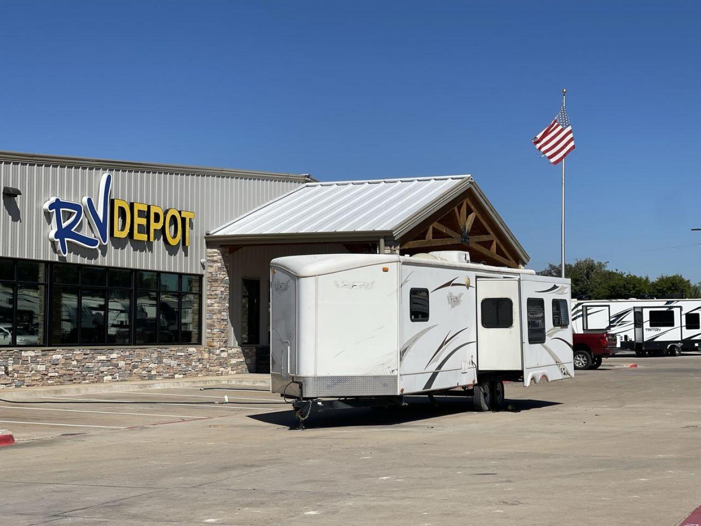 2008 WHITE VR-1 299RLS (4YDT299268V) , Length: 33 ft. | Dry Weight: 6,810 lbs. | Slides: 1 transmission, located at 4319 N Main St, Cleburne, TX, 76033, (817) 678-5133, 32.385960, -97.391212 - The 2008 VR-1 299RLS is a dual-axle steel wheel setup measuring 33 ft. long and 11.17 ft. tall. It has a dry weight of 6,810 lbs. and a payload capacity of 2,805 lbs. It also has a hitch weight of 815 lbs. It includes one slide and one power awning. This travel trailer features a rear living floorpl - Photo#0