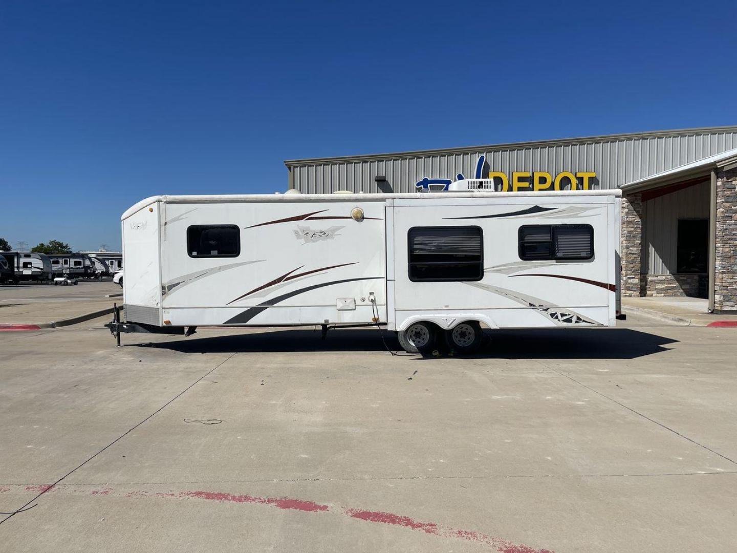 2008 WHITE VR-1 299RLS (4YDT299268V) , Length: 33 ft. | Dry Weight: 6,810 lbs. | Slides: 1 transmission, located at 4319 N Main St, Cleburne, TX, 76033, (817) 678-5133, 32.385960, -97.391212 - The 2008 VR-1 299RLS is a dual-axle steel wheel setup measuring 33 ft. long and 11.17 ft. tall. It has a dry weight of 6,810 lbs. and a payload capacity of 2,805 lbs. It also has a hitch weight of 815 lbs. It includes one slide and one power awning. This travel trailer features a rear living floorpl - Photo#23