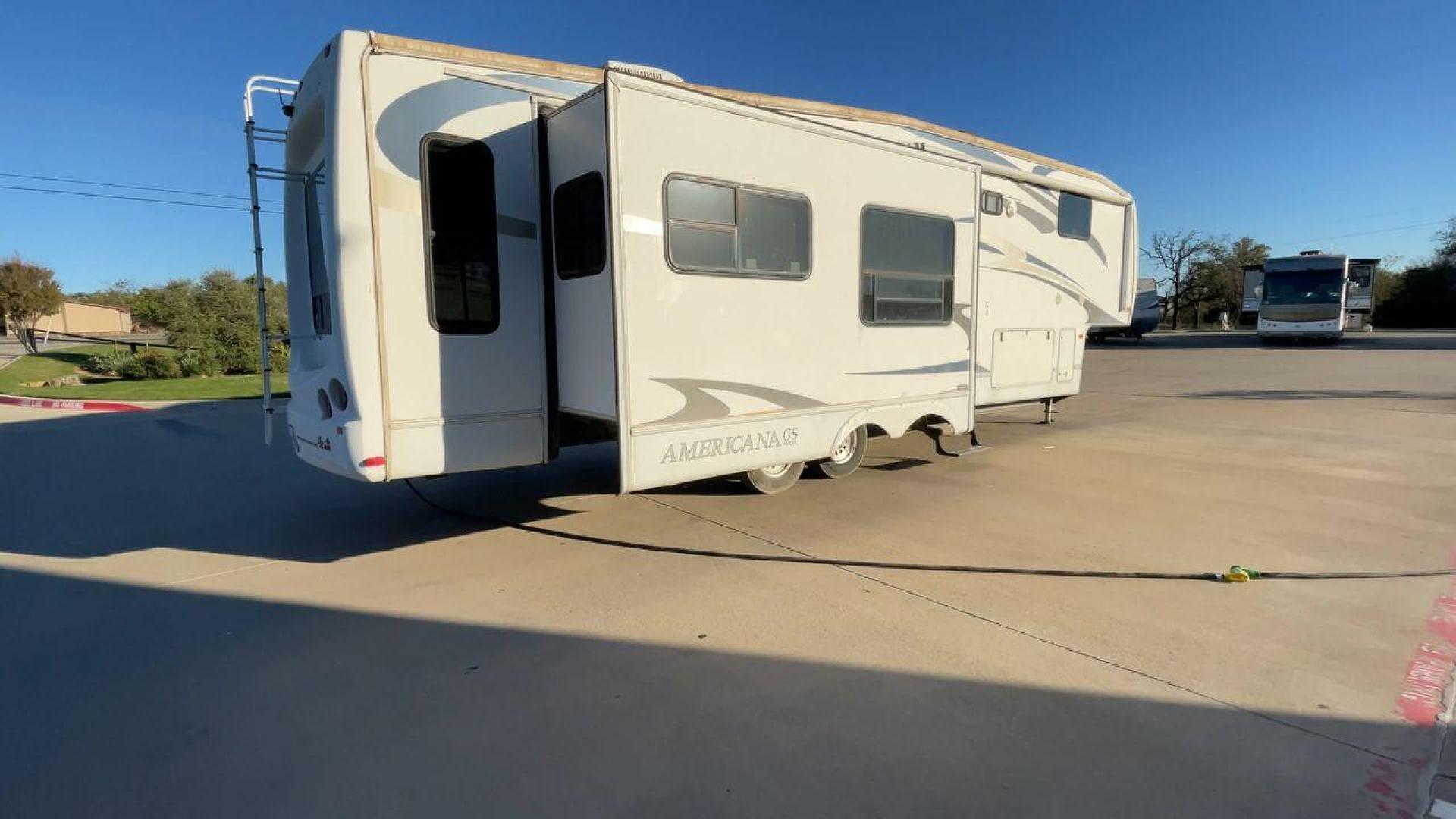 2009 FOREST RIVER CARDINAL 37RL - (4X4FCAJ299G) , located at 4319 N Main St, Cleburne, TX, 76033, (817) 678-5133, 32.385960, -97.391212 - Photo#1