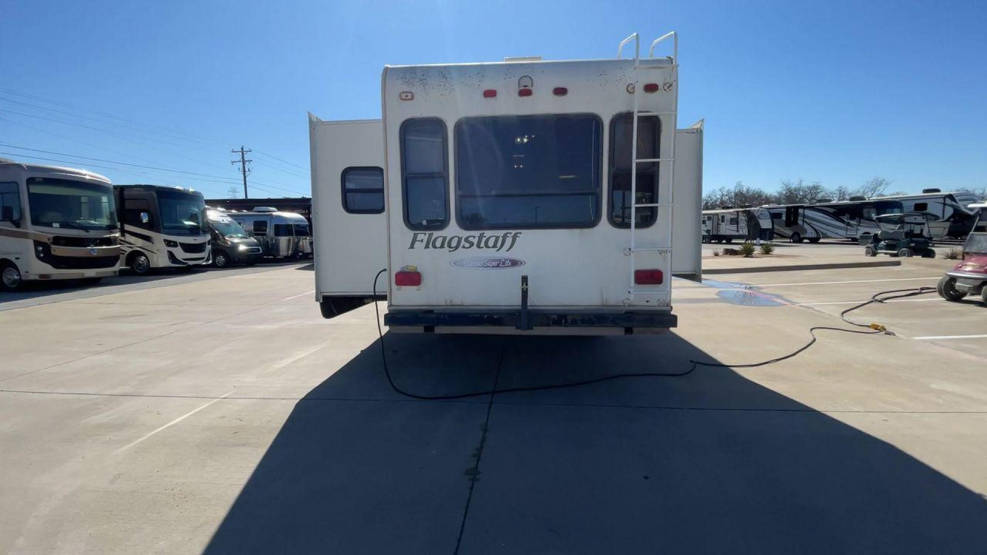 2010 WHITE FLAGSTAFF 8528CKSS - (4X4FFLD20A1) , Length: 30 ft. | Dry Weight: 6,877 lbs. | Slides: 2 transmission, located at 4319 N Main St, Cleburne, TX, 76033, (817) 678-5133, 32.385960, -97.391212 - Photo#8