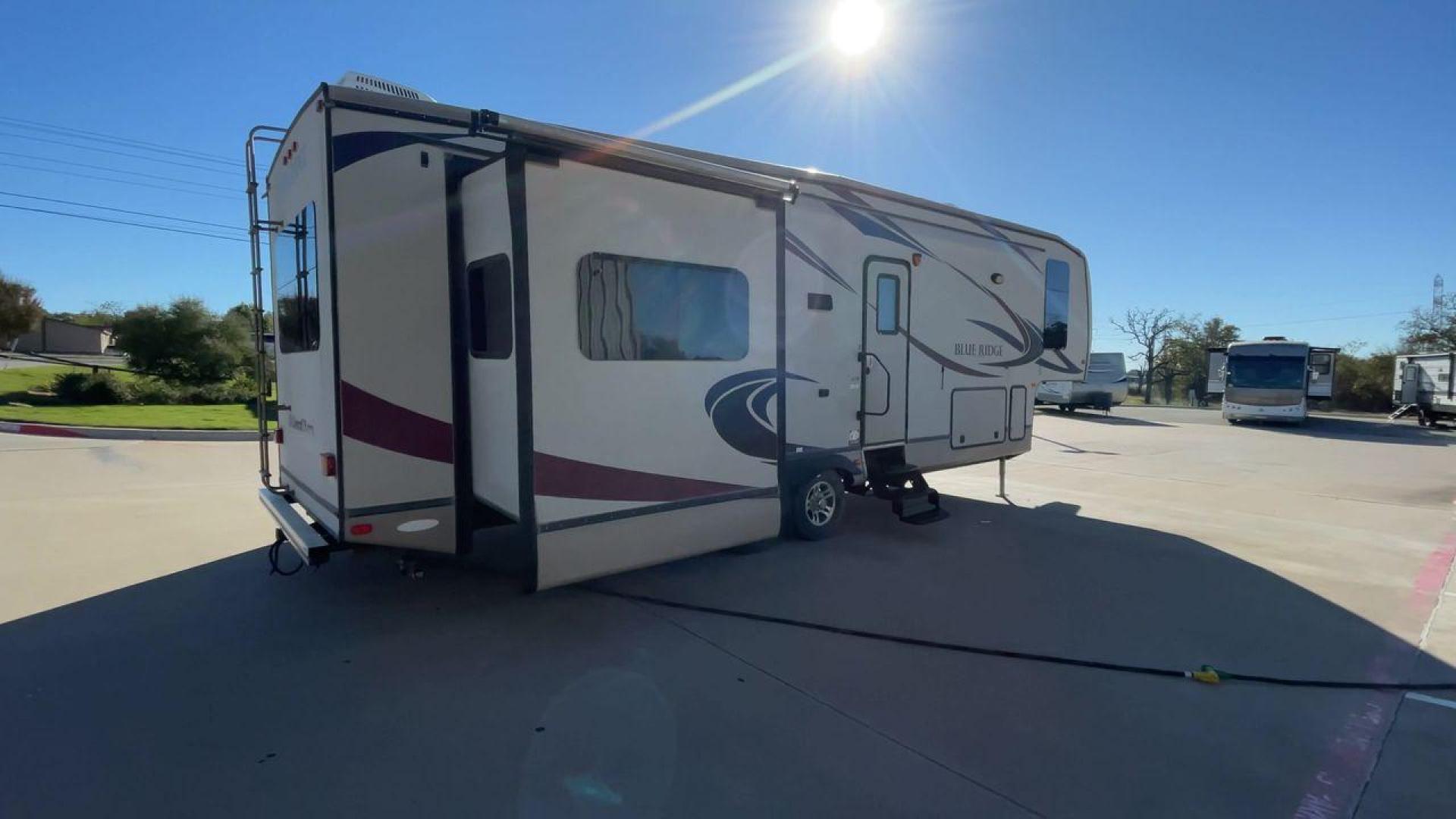 2011 TAN BLUE RIDGE 3125 (4X4FBLG22BG) , Length: 35.17 ft. | Dry Weight: 11,079 lbs. | Gross Weight: 13,975 lbs. | Slides: 3 transmission, located at 4319 N Main St, Cleburne, TX, 76033, (817) 678-5133, 32.385960, -97.391212 - Discover the perfect blend of comfort and functionality with the 2011 Blue Ridge 3125. It is a meticulously designed fifth-wheel trailer crafted for unforgettable travel experiences. Extending to 35 feet, this model incorporates three slide-outs, ingeniously expanding the living space to create an i - Photo#1