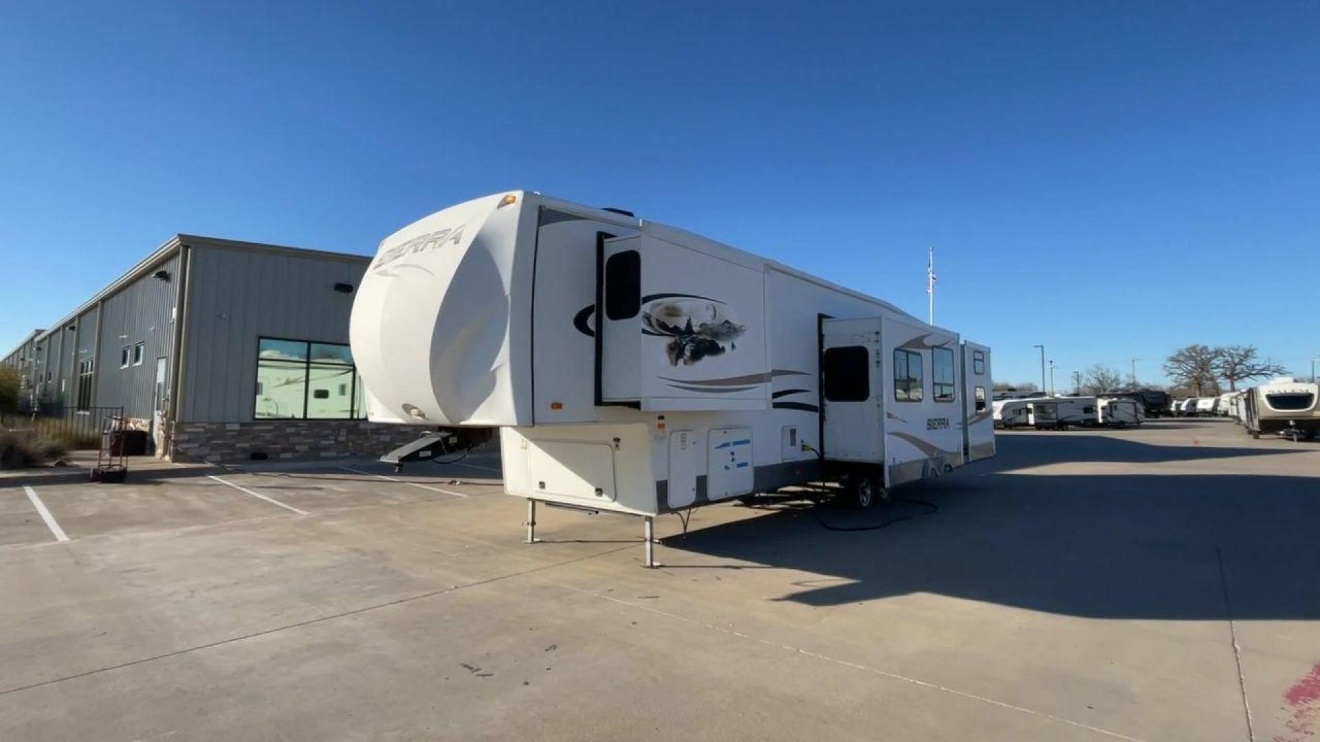 2011 WHITE FOREST RIVER SIERRA (4X4FSEN20BJ) , Length: 41.58 ft. | Dry Weight: 11,873 lbs. | Gross Weight: 14,060 lbs. | Slides: 4 transmission, located at 4319 N Main St, Cleburne, TX, 76033, (817) 678-5133, 32.385960, -97.391212 - Enjoy your journeys as treasured chapters in your life, and turn every road into your family's playground in the 2011 Forest River Sierra 365SAQ. The measurements for this unit are 41.58 ft in length by 13 ft in height. It has a dry weight of 11,873 lbs with a GVWR of about 14,060 lbs and a hitch we - Photo#5