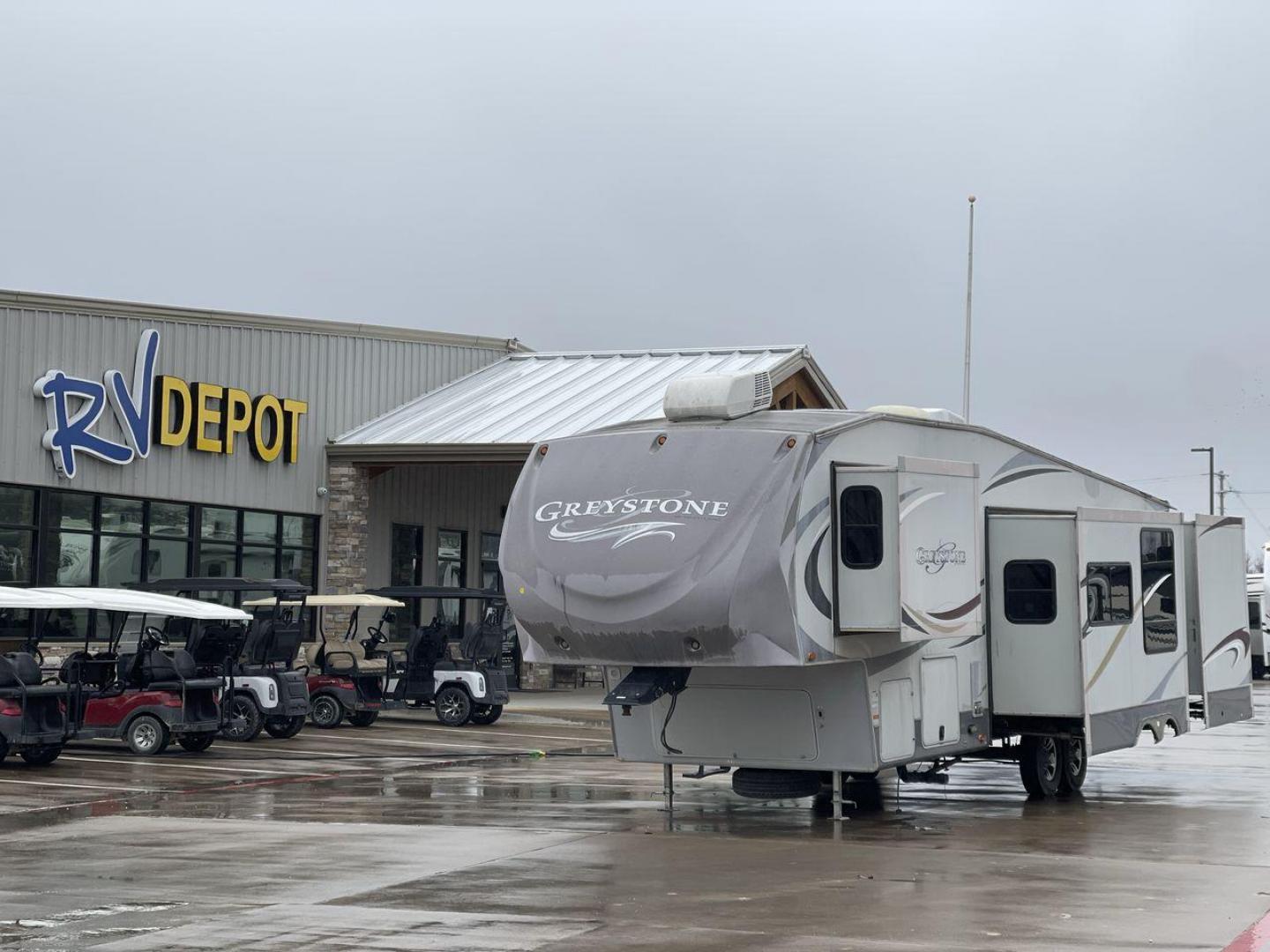 2011 GRAY GREYSTONE 33QB - (5SFSG3624BE) , Length: 36.8 ft. | Dry Weight: 11,466 lbs. | Gross Weight: 13,935 lbs. | Slides: 4 transmission, located at 4319 N Main St, Cleburne, TX, 76033, (817) 678-5133, 32.385960, -97.391212 - Reasons to buy this RV include: (1) With four generous slide-outs, the interior space of this RV expands dramatically, providing ample room for relaxation and entertainment. (2) It features high-gloss fiberglass finish offers a sleek, modern aesthetic while providing a durable and low-maintenance - Photo#0