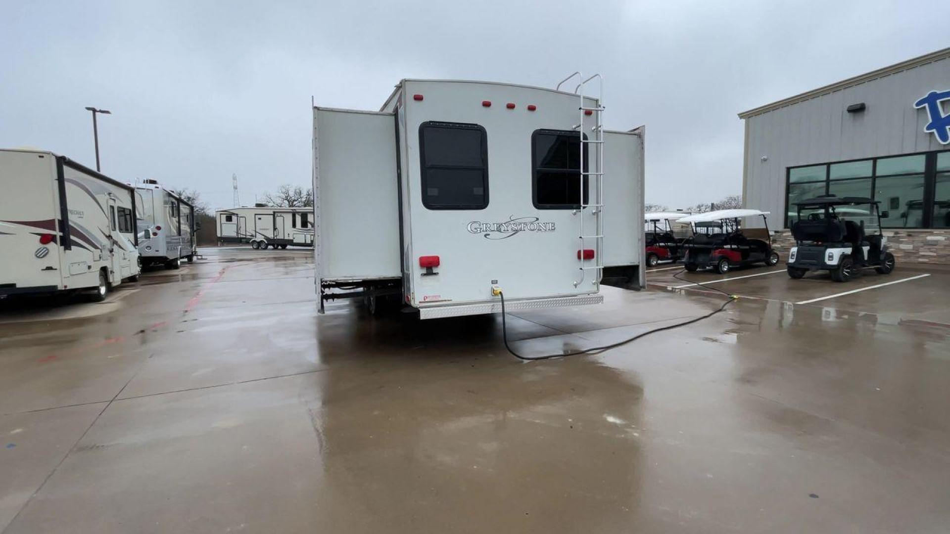 2011 GRAY GREYSTONE 33QB - (5SFSG3624BE) , Length: 36.8 ft. | Dry Weight: 11,466 lbs. | Gross Weight: 13,935 lbs. | Slides: 4 transmission, located at 4319 N Main St, Cleburne, TX, 76033, (817) 678-5133, 32.385960, -97.391212 - Reasons to buy this RV include: (1) With four generous slide-outs, the interior space of this RV expands dramatically, providing ample room for relaxation and entertainment. (2) It features high-gloss fiberglass finish offers a sleek, modern aesthetic while providing a durable and low-maintenance - Photo#8