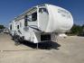 2011 WHITE HEARTLAND ROAD WARRIOR 305RW (5SFCG3021BE) , Length: 35.17 ft. | Dry Weight: 11,186 lbs. | Gross Weight: 14,000 lbs. | Slides: 2 transmission, located at 4319 N Main St, Cleburne, TX, 76033, (817) 678-5133, 32.385960, -97.391212 - With a length of 35.17 ft. and a dry weight of 11,186 lbs, the 2011 Heartland Road Warrior 305RW offers a robust and stylish exterior, designed for both durability and convenience during travel. Its aerodynamic front cap enhances the overall look and performance on the road. The exterior features a - Photo#22