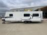 2011 KZ SPREE 323 RL (4EZTP3225B8) , located at 4319 N Main St, Cleburne, TX, 76033, (817) 678-5133, 32.385960, -97.391212 - The 2011 KZSP CT features a clean and functional exterior design with practicality at its core. The white exterior is complemented by simple black graphic accents that stretch along the sides, providing a subtle yet stylish contrast. At the rear, the trailer includes a window for added natural light - Photo#24