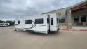 2011 KZ SPREE 323 RL (4EZTP3225B8) , located at 4319 N Main St, Cleburne, TX, 76033, (817) 678-5133, 32.385960, -97.391212 - The 2011 KZSP CT features a clean and functional exterior design with practicality at its core. The white exterior is complemented by simple black graphic accents that stretch along the sides, providing a subtle yet stylish contrast. At the rear, the trailer includes a window for added natural light - Photo#7