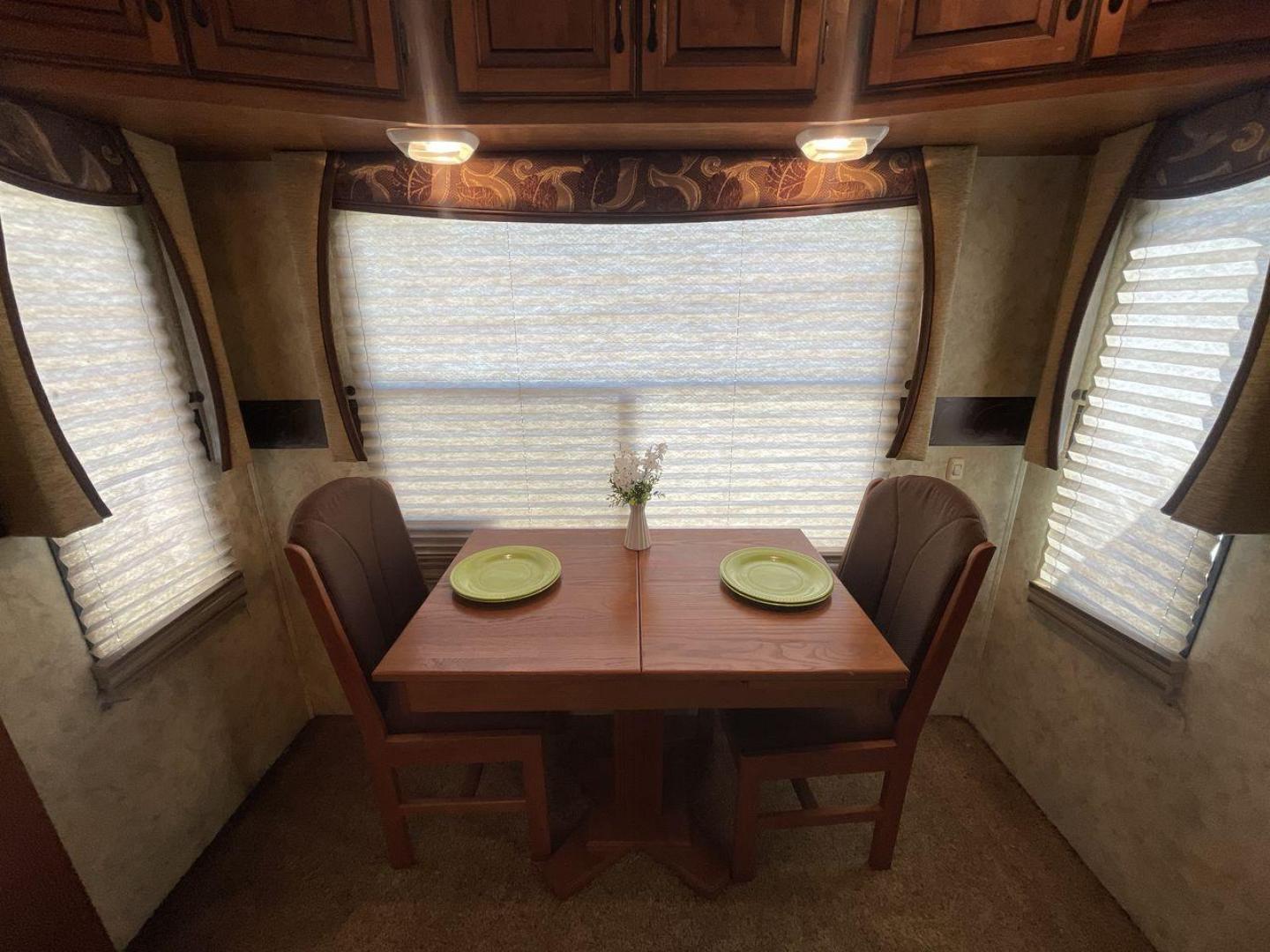 2012 COACHMEN NORTH RIDGE 320RLQ (5ZT3NRXB6CA) , Length: 37.17 ft. | Dry Weight: 10,405 lbs. | Gross Weight: 15,000 lbs. | Slides: 4 transmission, located at 4319 N Main St, Cleburne, TX, 76033, (817) 678-5133, 32.385960, -97.391212 - The 2012 Coachmen North Ridge 320RLQ is a 37-foot fifth wheel with four slides and an aluminum frame. With the quadruple slides, space and storage will never be an issue! The unit also comes with automatic heating and cooling rated at 40,000 and 15,000 BTUs, respectively. The interior has beautiful - Photo#12