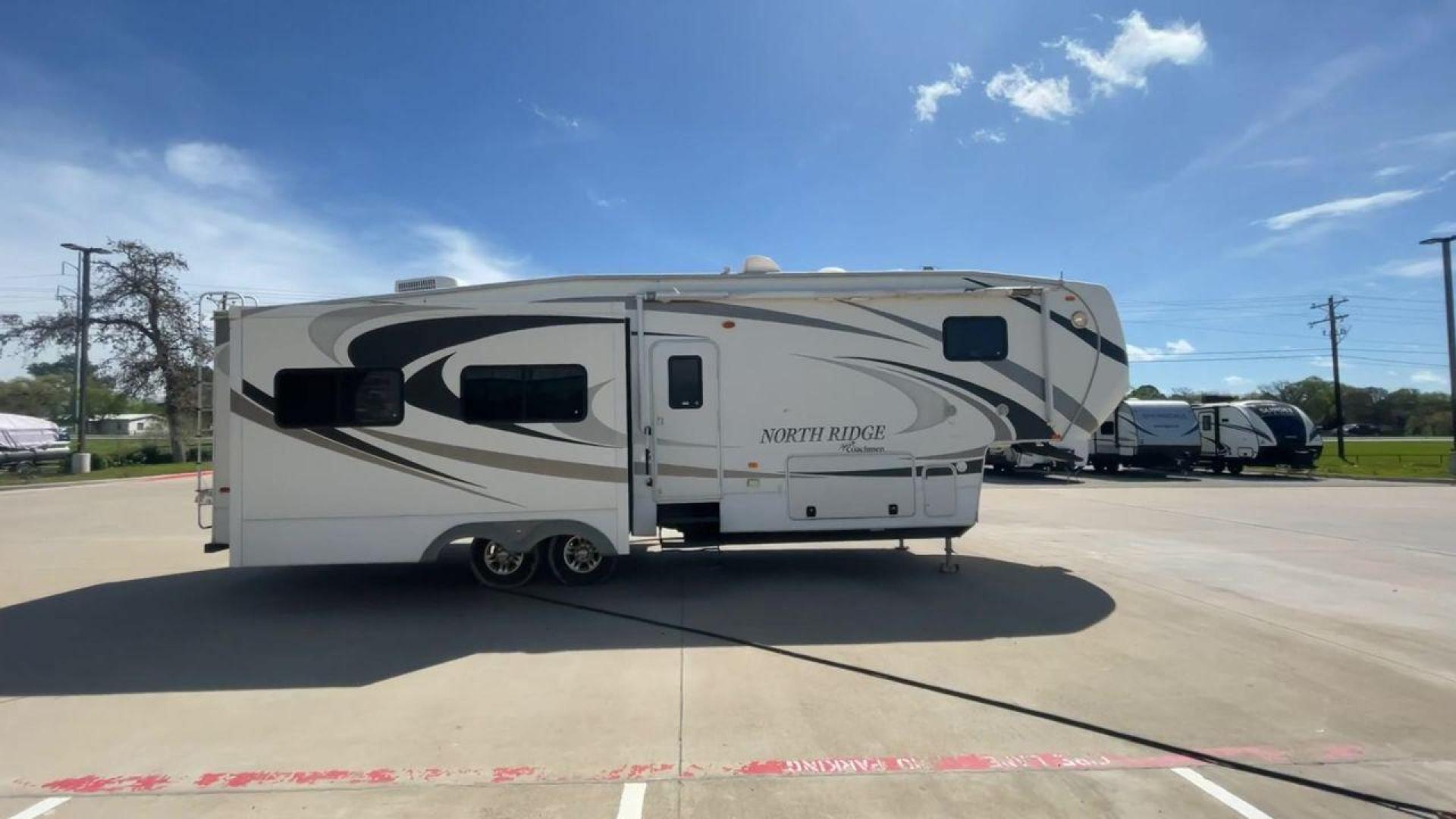 2012 COACHMEN NORTH RIDGE 320RLQ (5ZT3NRXB6CA) , Length: 37.17 ft. | Dry Weight: 10,405 lbs. | Gross Weight: 15,000 lbs. | Slides: 4 transmission, located at 4319 N Main St, Cleburne, TX, 76033, (817) 678-5133, 32.385960, -97.391212 - The 2012 Coachmen North Ridge 320RLQ is a 37-foot fifth wheel with four slides and an aluminum frame. With the quadruple slides, space and storage will never be an issue! The unit also comes with automatic heating and cooling rated at 40,000 and 15,000 BTUs, respectively. The interior has beautiful - Photo#2