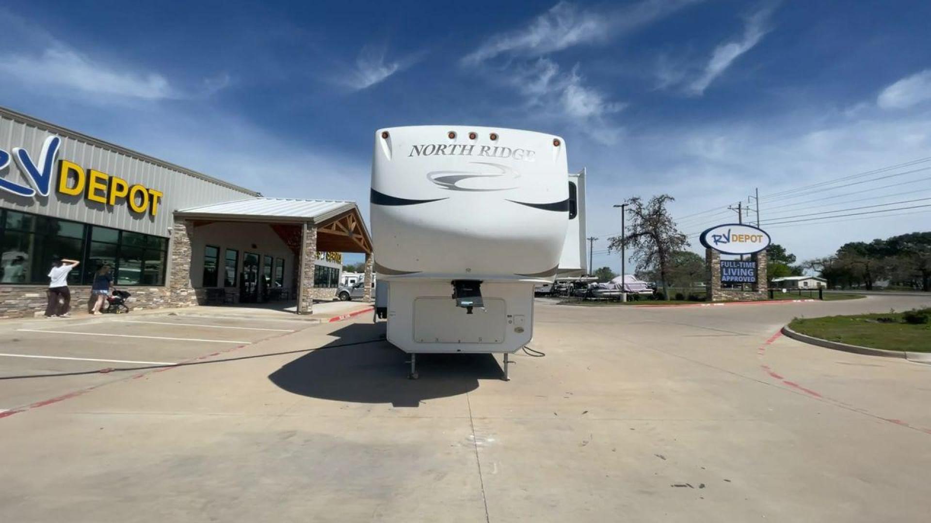 2012 COACHMEN NORTH RIDGE 320RLQ (5ZT3NRXB6CA) , Length: 37.17 ft. | Dry Weight: 10,405 lbs. | Gross Weight: 15,000 lbs. | Slides: 4 transmission, located at 4319 N Main St, Cleburne, TX, 76033, (817) 678-5133, 32.385960, -97.391212 - The 2012 Coachmen North Ridge 320RLQ is a 37-foot fifth wheel with four slides and an aluminum frame. With the quadruple slides, space and storage will never be an issue! The unit also comes with automatic heating and cooling rated at 40,000 and 15,000 BTUs, respectively. The interior has beautiful - Photo#4