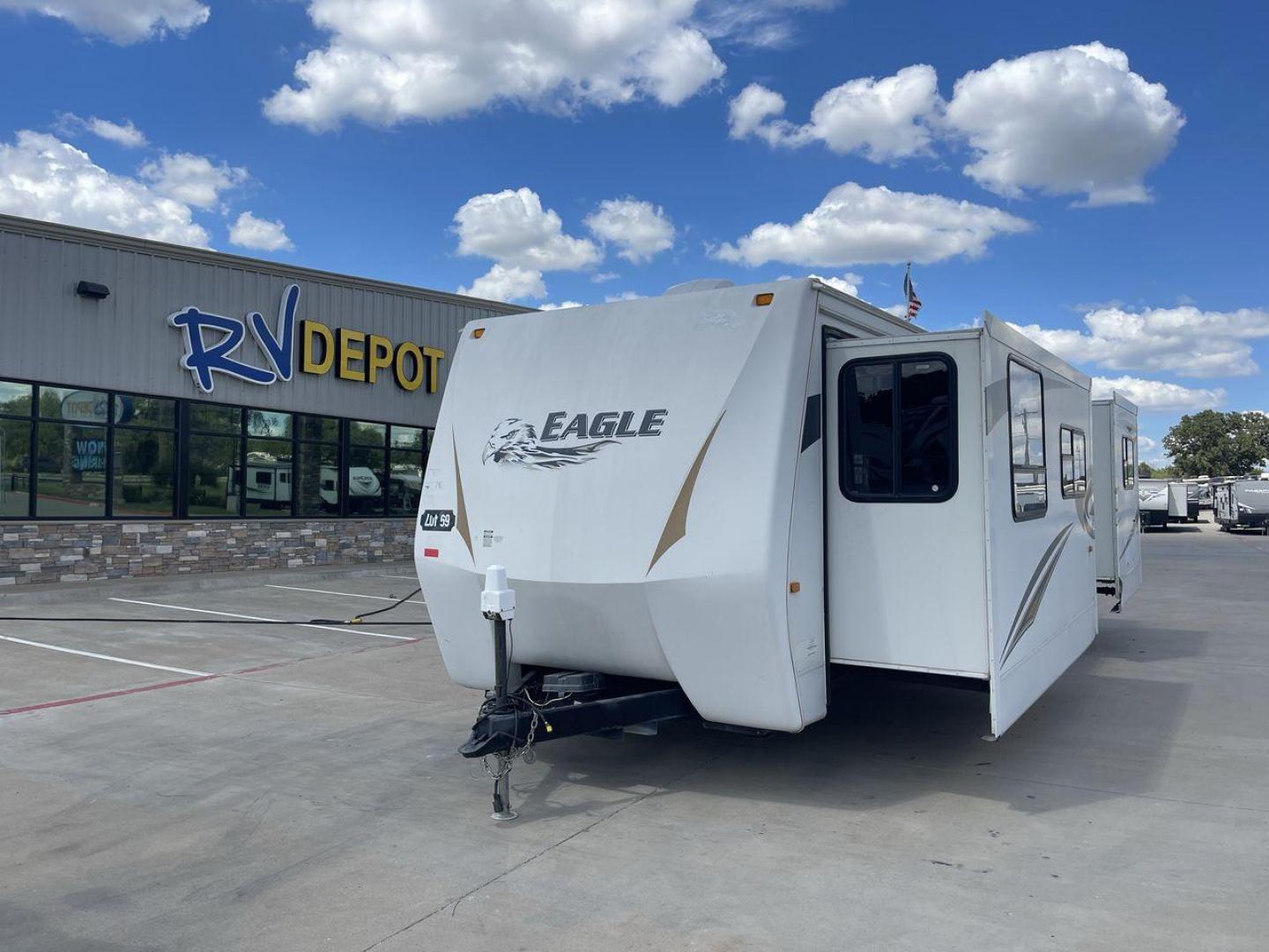 2012 WHITE JAYCO EAGLE 322FKS (1UJBJ0BR3C1) , Length: 33.92 ft. | Dry Weight: 7,835 lbs. | Gross Weight: 10,250 lbs. | Slides: 2 transmission, located at 4319 N Main St, Cleburne, TX, 76033, (817) 678-5133, 32.385960, -97.391212 - The 2012 Jayco Eagle 322FKS is a dual-axle aluminum wheel set-up that measures 33.92 ft. in length. It has a dry weight of 7,835 lbs. and a GVWR of 10,250 lbs. Its exterior is a base color of white with gray, black and gold accents. This trailer has 2 slides. This Jayco has a rear bedroom, front - Photo#0