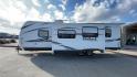 2012 WHITE KEYSTONE OUTBACK 292BH (4YDT29225CB) , Length: 32.75 | Dry Weight: 6,559 lbs. | Gross Weight: 8,200 lbs. | Slides: 1 transmission, located at 4319 N Main St, Cleburne, TX, 76033, (817) 678-5133, 32.385960, -97.391212 - The 2012 Keystone Outback 292BH is a versatile and well-equipped travel trailer perfect for enjoyable family adventures. This model offers a great balance between spaciousness and towability, with a length of 32.75 feet and a dry weight of 6,559 pounds. With a single slide, the Outback 292BH provide - Photo#6