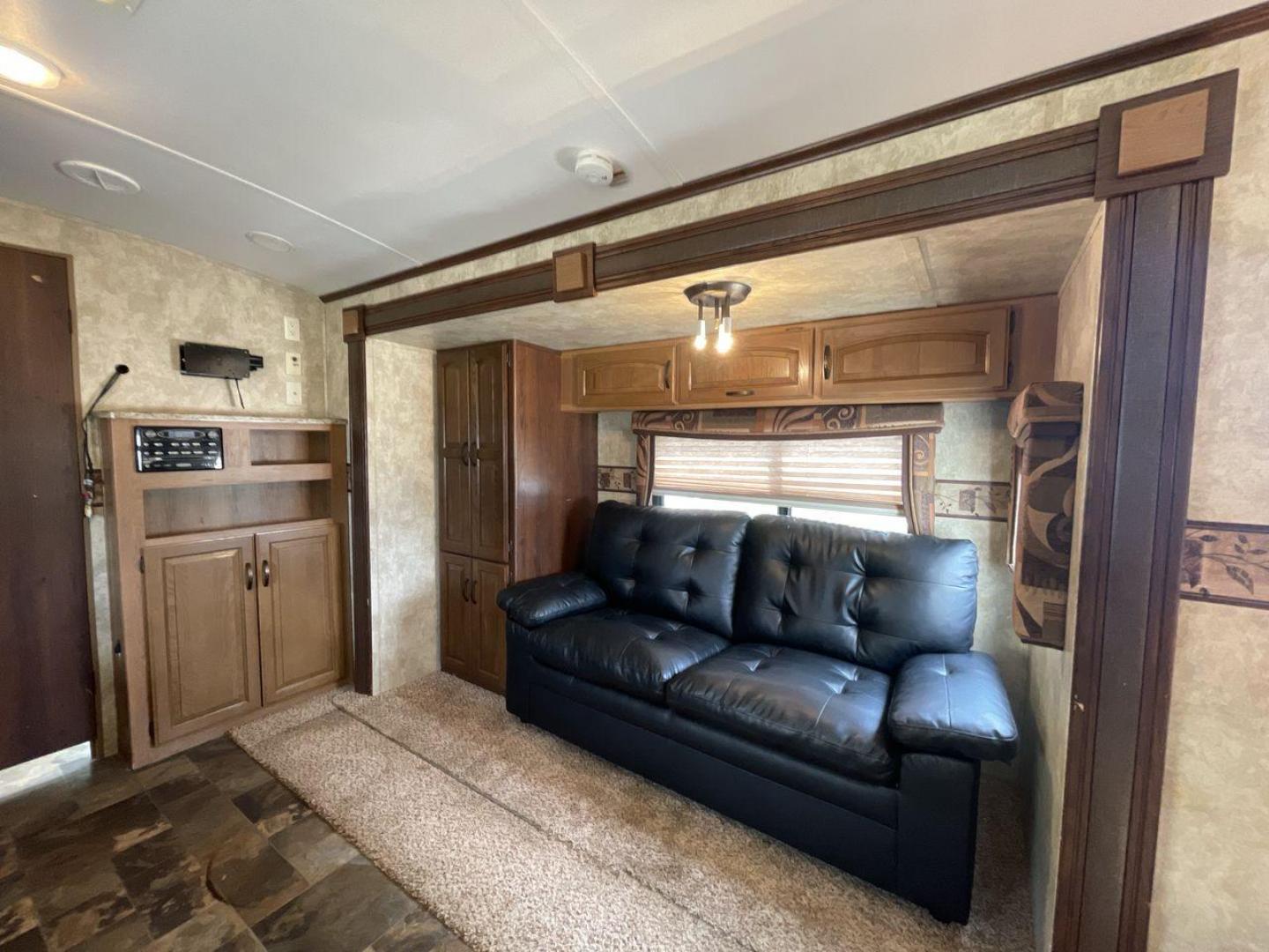 2012 KEYSTONE RV OUTBACK 274RB (4YDT27420CB) , Length: 30.33 ft | Dry Weight: 5,995 lbs. | Gross Weight: 7,800 lbs. | Slides: 1 transmission, located at 4319 N Main St, Cleburne, TX, 76033, (817) 678-5133, 32.385960, -97.391212 - Experience the 2012 Keystone RV Outback 274RB Travel Trailer, the ideal fusion of adventure and comfort. This well-built travel trailer is a great option for any family or couple looking for a roomy and fashionable mobile home. The dimensions of this unit are 30.33 ft in length, 8 ft in width, an - Photo#11