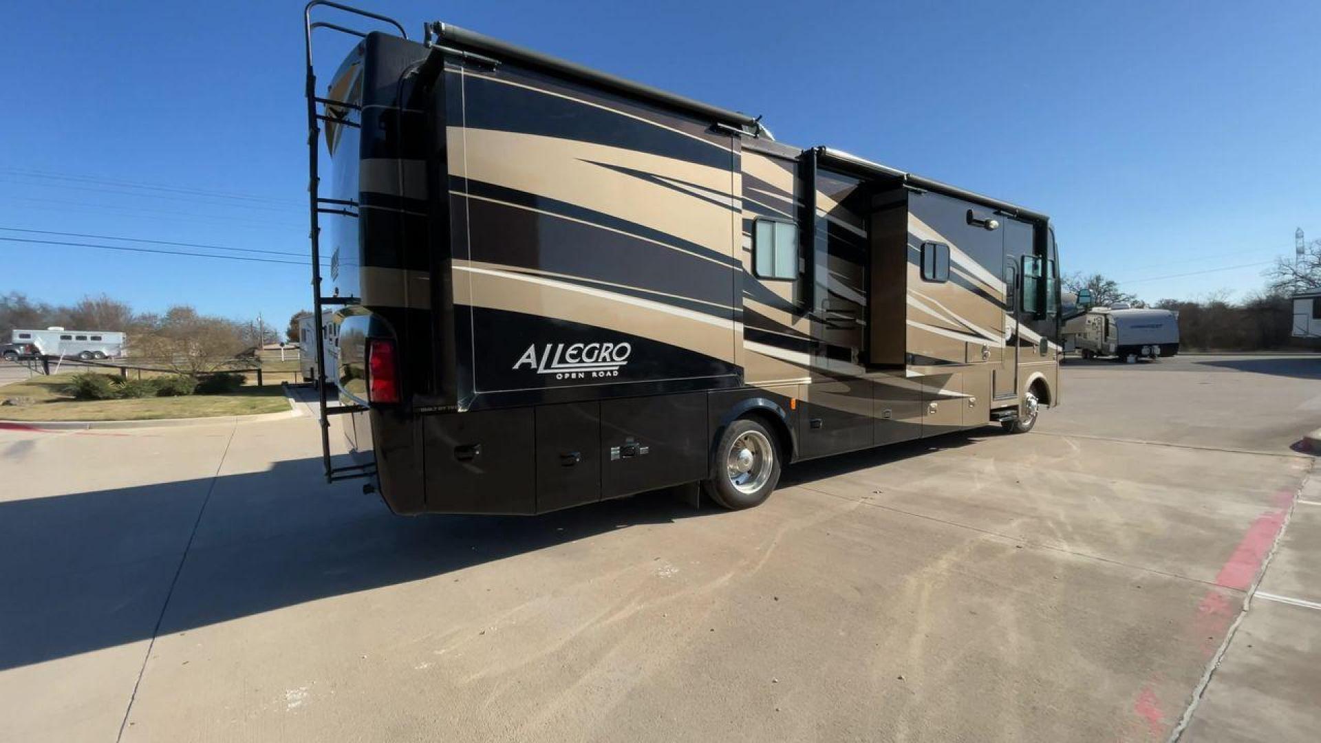 2012 TIFFIN ALLEGRO 34TGA (1F66F5DY6C0) , Length: 34.83 ft | Gross Weight: 22,000 lbs | Slides: 3 transmission, located at 4319 N Main St, Cleburne, TX, 76033, (817) 678-5133, 32.385960, -97.391212 - The 2012 Tiffin Allegro 34TGA is a luxurious Class A motorhome that combines elegant design, high-quality construction, and premium features for travelers seeking comfort and style on the road. Known for its solid build and well-appointed amenities, the Allegro 34TGA is perfect for long road trips, - Photo#1