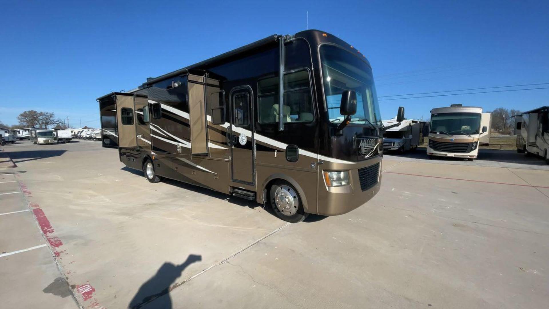 2012 TIFFIN ALLEGRO 34TGA (1F66F5DY6C0) , Length: 34.83 ft | Gross Weight: 22,000 lbs | Slides: 3 transmission, located at 4319 N Main St, Cleburne, TX, 76033, (817) 678-5133, 32.385960, -97.391212 - The 2012 Tiffin Allegro 34TGA is a luxurious Class A motorhome that combines elegant design, high-quality construction, and premium features for travelers seeking comfort and style on the road. Known for its solid build and well-appointed amenities, the Allegro 34TGA is perfect for long road trips, - Photo#3