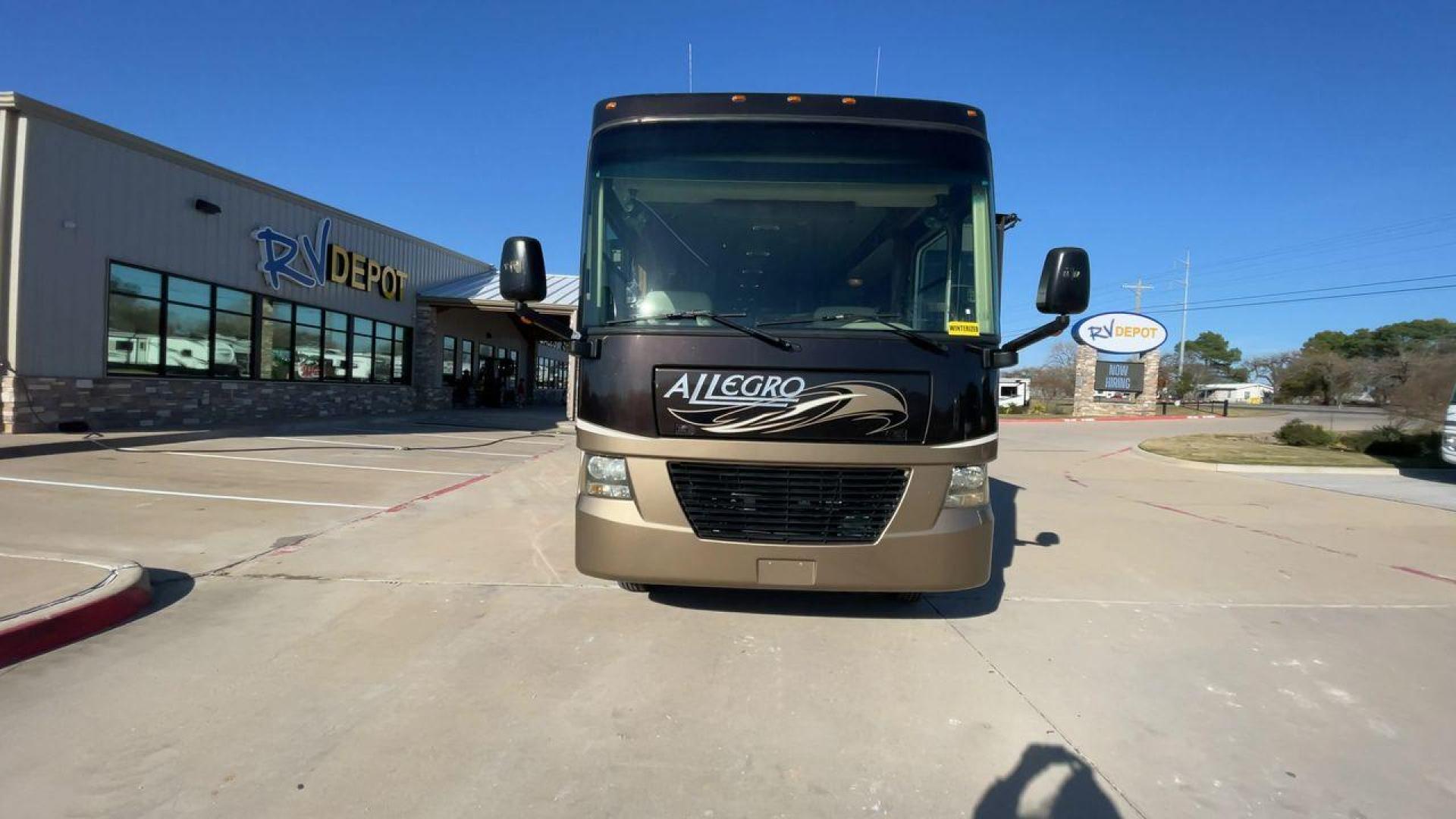 2012 TIFFIN ALLEGRO 34TGA (1F66F5DY6C0) , Length: 34.83 ft | Gross Weight: 22,000 lbs | Slides: 3 transmission, located at 4319 N Main St, Cleburne, TX, 76033, (817) 678-5133, 32.385960, -97.391212 - The 2012 Tiffin Allegro 34TGA is a luxurious Class A motorhome that combines elegant design, high-quality construction, and premium features for travelers seeking comfort and style on the road. Known for its solid build and well-appointed amenities, the Allegro 34TGA is perfect for long road trips, - Photo#4