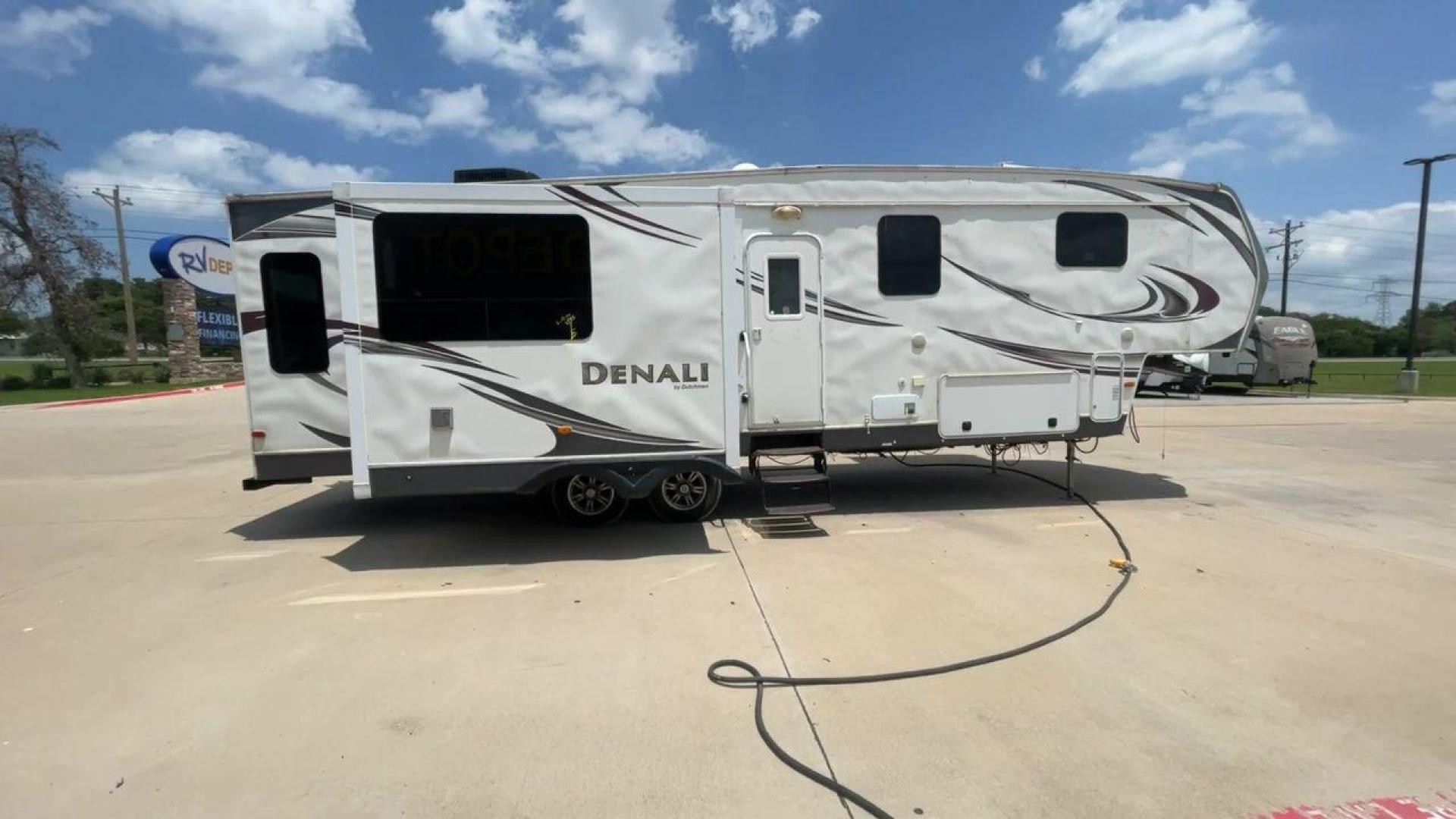 2013 WHITE DENALI 319RLS (47CFD1S24DP) , Length: 35.5 ft. | Dry Weight: 9,326 lbs. | Slides: 3 transmission, located at 4319 N Main St, Cleburne, TX, 76033, (817) 678-5133, 32.385960, -97.391212 - Looking for a nice-sized family fifth wheel suitable for residential living? Check out this 2013 Dutchmen Denali 319RLS! This fifth wheel measures 35.5 feet long and 12.08 feet tall. It has a dry weight of 9,326 lbs. and a payload capacity of 2,866 lbs. It includes three power slides as well as o - Photo#2