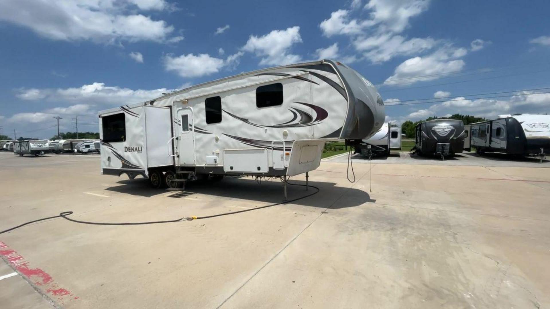 2013 WHITE DENALI 319RLS (47CFD1S24DP) , Length: 35.5 ft. | Dry Weight: 9,326 lbs. | Slides: 3 transmission, located at 4319 N Main St, Cleburne, TX, 76033, (817) 678-5133, 32.385960, -97.391212 - Looking for a nice-sized family fifth wheel suitable for residential living? Check out this 2013 Dutchmen Denali 319RLS! This fifth wheel measures 35.5 feet long and 12.08 feet tall. It has a dry weight of 9,326 lbs. and a payload capacity of 2,866 lbs. It includes three power slides as well as o - Photo#3