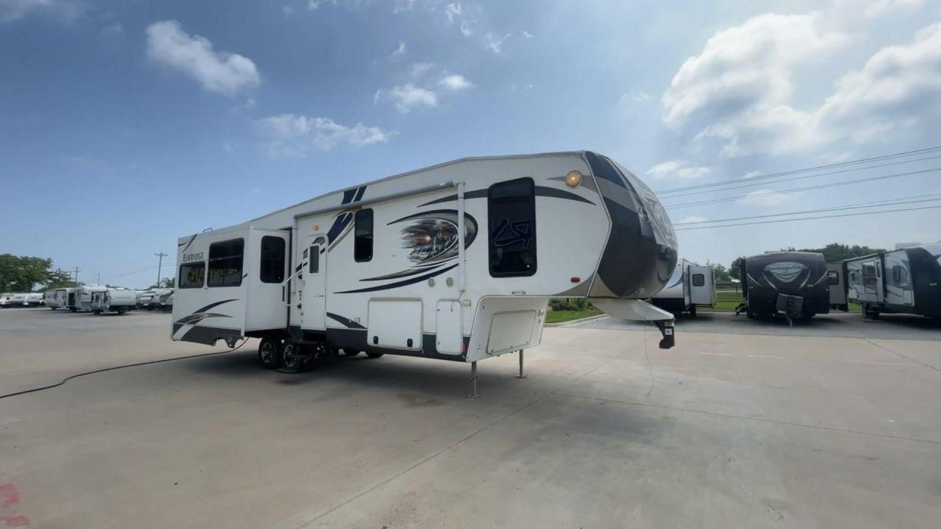 2013 ELKRIDGE 32TSRE - (5SFRG3623DE) , Length: 36.92 ft. | Dry Weight: 10,502 lbs. | Gross Weight: 14,405 lbs. | Slides: 3 transmission, located at 4319 N Main St, Cleburne, TX, 76033, (817) 678-5133, 32.385960, -97.391212 - The 2013 Elkridge 32TSRE fifth wheel has dimensions of 36.92 ft length, 8 ft width, and 12.92 ft height. It has a dry weight of about 10,502 lbs with a payload capacity of 3,903 lbs. The GVWR of this unit is 14,405 lbs and has a hitch weight of 2,075 lbs. It comes with three power slideouts and one - Photo#3