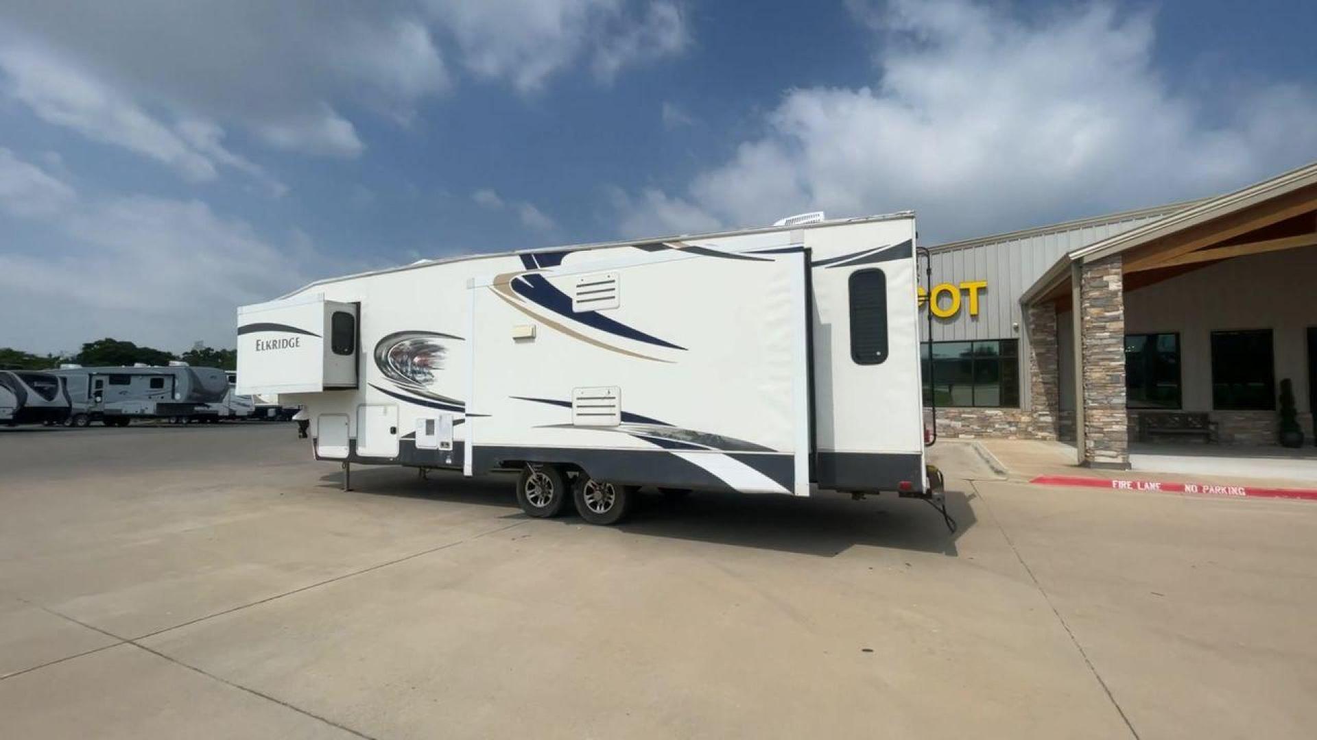 2013 ELKRIDGE 32TSRE - (5SFRG3623DE) , Length: 36.92 ft. | Dry Weight: 10,502 lbs. | Gross Weight: 14,405 lbs. | Slides: 3 transmission, located at 4319 N Main St, Cleburne, TX, 76033, (817) 678-5133, 32.385960, -97.391212 - The 2013 Elkridge 32TSRE fifth wheel has dimensions of 36.92 ft length, 8 ft width, and 12.92 ft height. It has a dry weight of about 10,502 lbs with a payload capacity of 3,903 lbs. The GVWR of this unit is 14,405 lbs and has a hitch weight of 2,075 lbs. It comes with three power slideouts and one - Photo#7