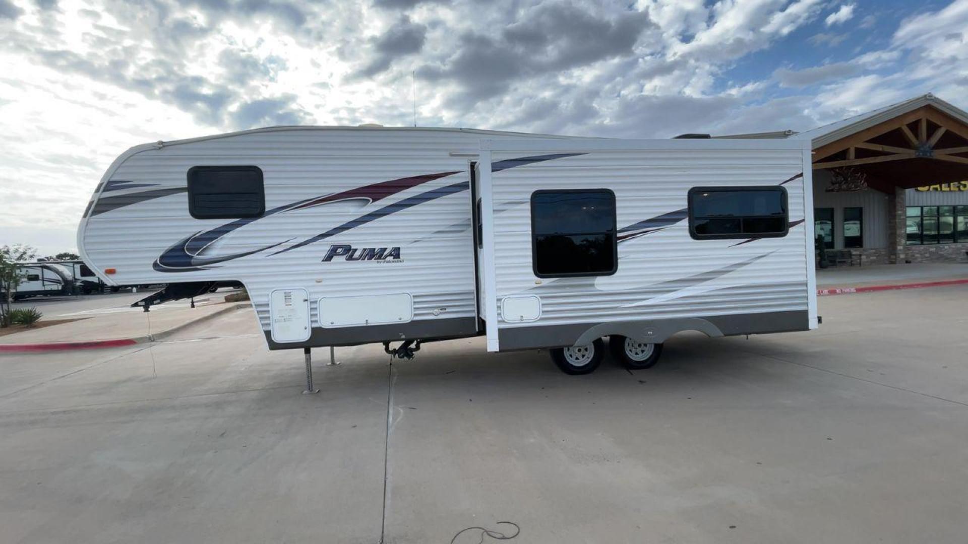 2013 FOREST RIVER PUMA 276RLSS (4X4FPAD29DP) , Length: 30.17 ft. | Dry Weight: 7,451 lbs. | Gross Weight: 10,273 lbs. | Slides: 1 transmission, located at 4319 N Main St, Cleburne, TX, 76033, (817) 678-5133, 32.385960, -97.391212 - The 2013 Forest River Puma 276RLSS, measuring 30.17 feet in length, has a dry weight of 7,451 pounds and a gross weight of 10,273 pounds. These specs automatically make it a durable and versatile fifth wheel. This unit features a single slideout, which expands the living space. The exterior design i - Photo#6