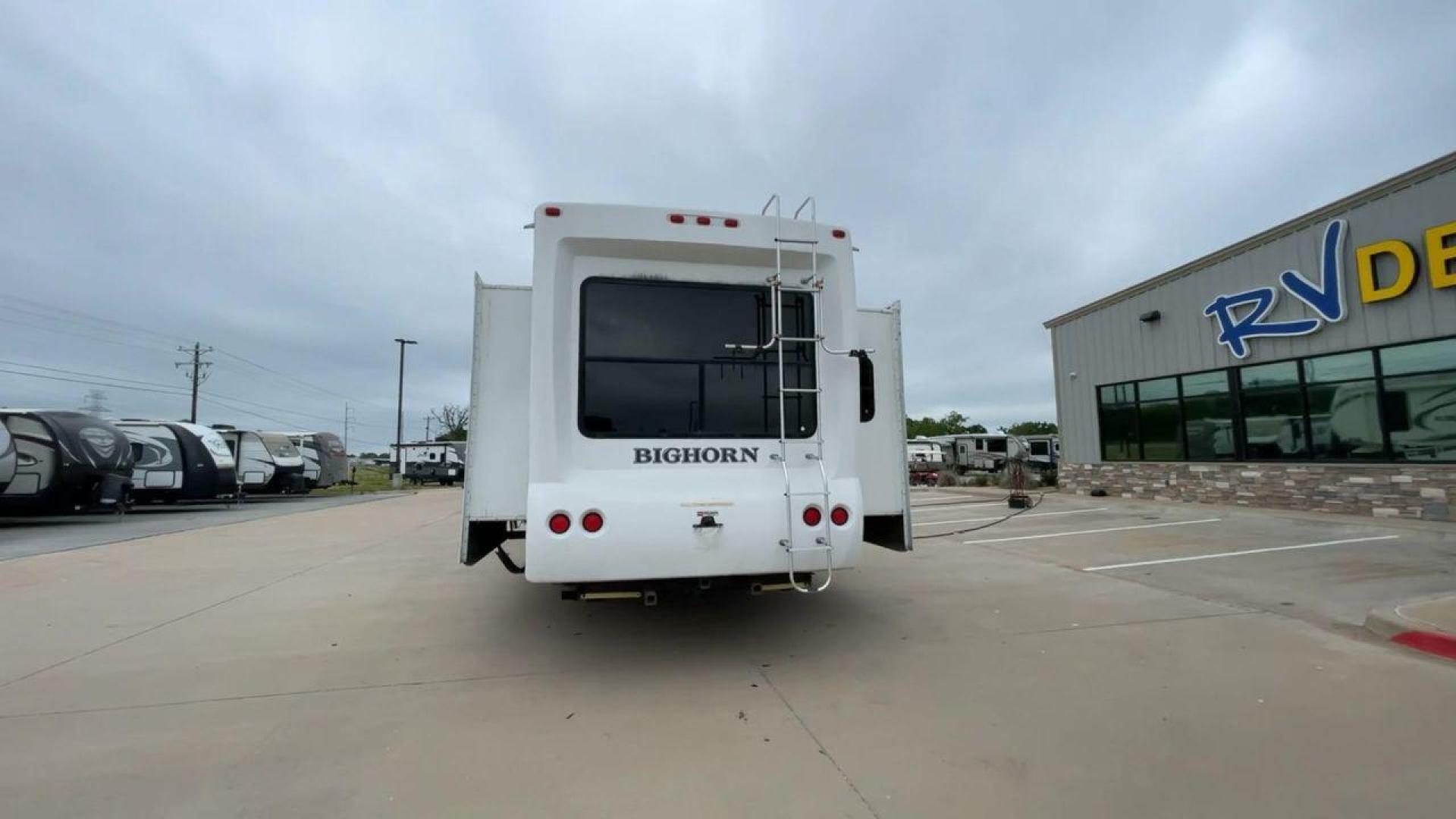 2013 WHITE HEARTLAND BIGHORN 3585RL - (5SFBG3826DE) , Length: 38.25 ft. | Dry Weight: 12,018 lbs. | Gross Weight: 15,500 lbs. | Slides: 3 transmission, located at 4319 N Main St, Cleburne, TX, 76033, (817) 678-5133, 32.385960, -97.391212 - The 2013 Heartland Big Horn 3585RL is a triple-slide fifth wheel measuring 38.25 ft. in length and crafted with aluminum and fiberglass, ensuring durability and longevity. With a dry weight of 12,018 lbs. and a GVWR of 15,500 lbs., this impressive model offers both practicality and versatility. The - Photo#8