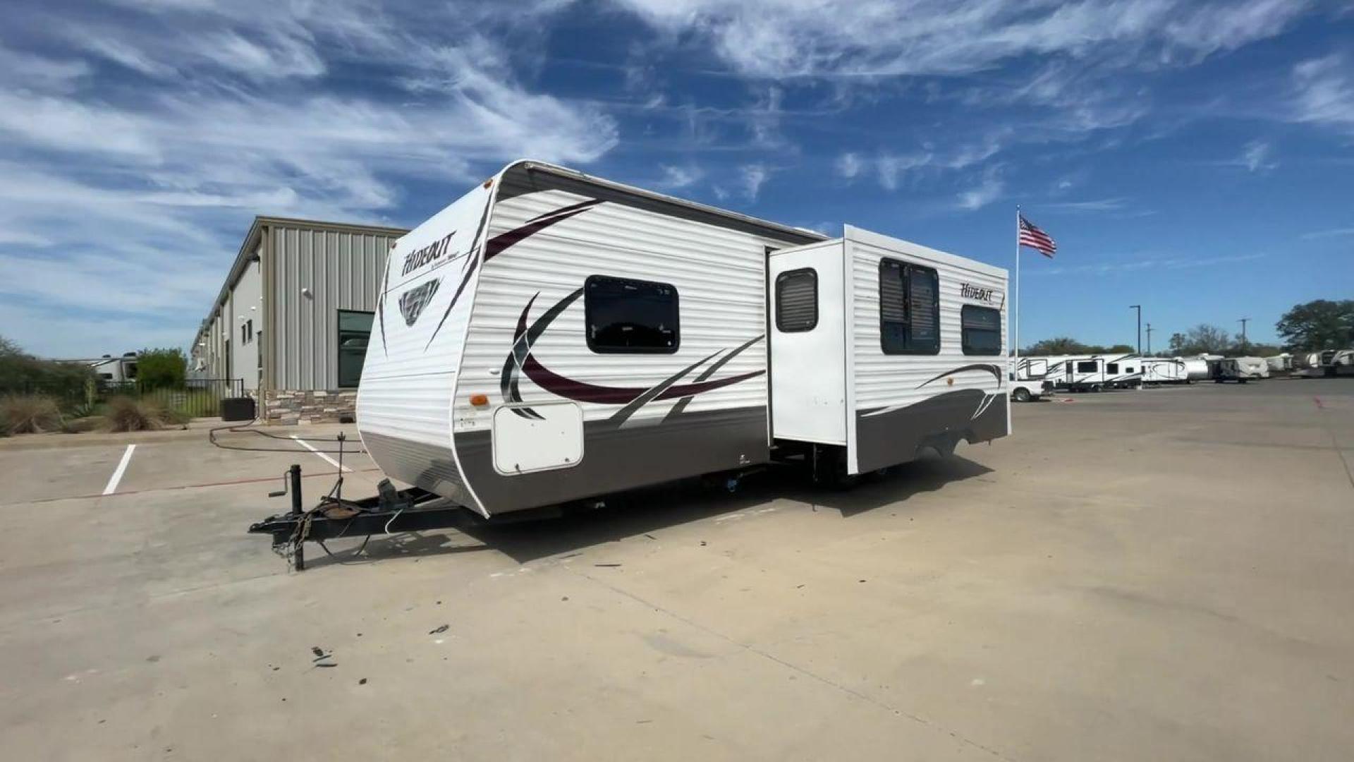 2013 WHITE KEYSTONE HIDEOUT 26RLS (4YDT26R27D7) , Length: 29.92 ft. | Dry Weight: 6,290 lbs. | Gross Weight: 7,825 lbs. | Slides: 1 transmission, located at 4319 N Main St, Cleburne, TX, 76033, (817) 678-5133, 32.385960, -97.391212 - Photo#5