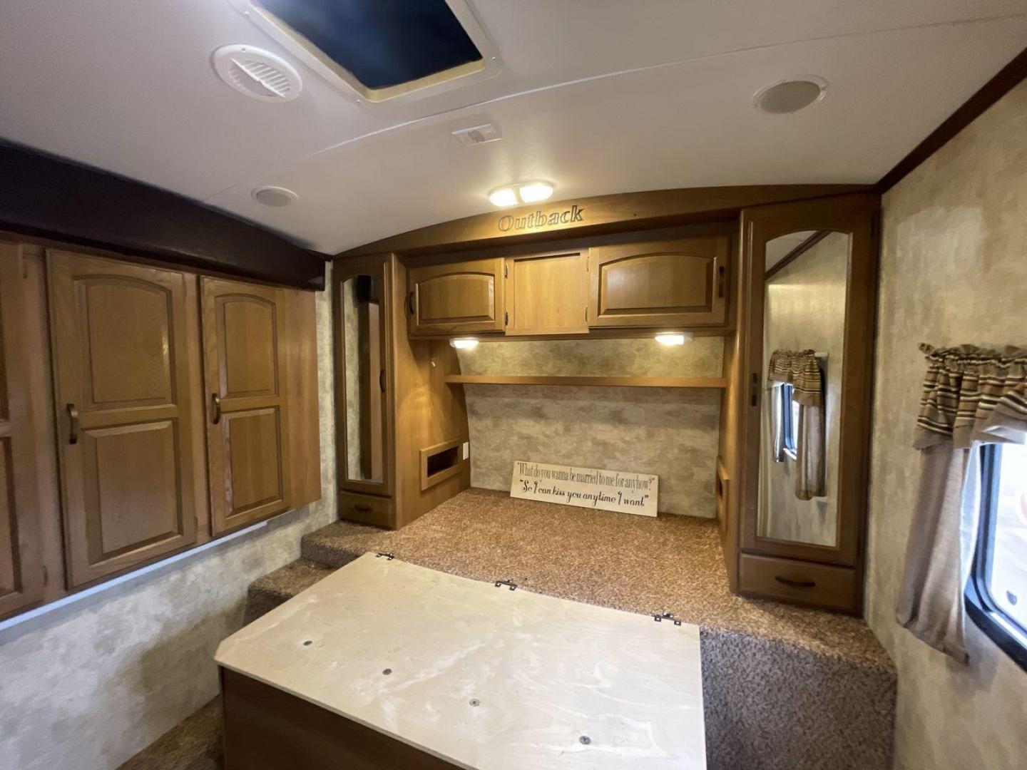 2013 KEYSTONE RV OUTBACK 298RE (4YDT29827DB) , Length: 35.17 ft.| Dry Weight: 7,443 lbs. | Gross Weight: 9,000 lbs. | Slides: 1 transmission, located at 4319 N Main St, Cleburne, TX, 76033, (817) 678-5133, 32.385960, -97.391212 - The 2013 Keystone RV Outback 298RE is an ideal camping trailer for a family that sets out to the great outdoors every week. This unit has measurements of 35.17 ft in length, 8 ft in width, and 10.92 ft in height. The dry weight is about 7,443 lbs with a payload capacity of 1,557 lbs. It has a GV - Photo#15