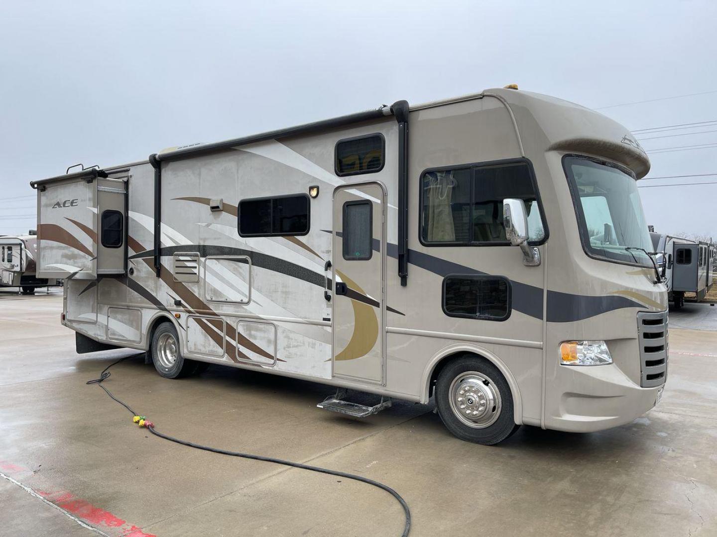 2014 TAN ACE 30.1 - (1F65F5DY8E0) , Length: 30.83 ft. | Gross Weight: 18,000 lbs. | Slides: 2 transmission, located at 4319 N Main St, Cleburne, TX, 76033, (817) 678-5133, 32.385960, -97.391212 - The 2014 ACE 30.1 is a Class A motorhome that is big and flexible, making it great for your next trip. This motorhome is the right size for getting around and is very comfortable. It is 30.83 feet long and weighs 18,000 pounds. The ACE 30.1 has two slides and a large 14-foot awning, so it has a lot - Photo#23