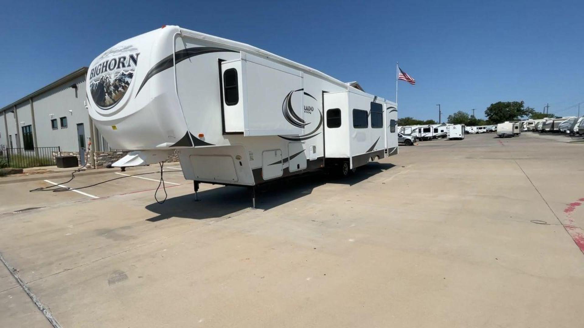 2014 WHITE BIGHORN SILVERADO 370QB (5SFBG4120EE) , Length: 41.58 ft. | Dry Weight: 11,660 lbs. | Gross Weight: 15,000 lbs. | Slides: 4 transmission, located at 4319 N Main St, Cleburne, TX, 76033, (817) 678-5133, 32.385960, -97.391212 - The 2014 Bighorn Silverado 37QB fifth wheel has a floorplan perfect for a family getaway. It features a bath and a half floorplan with a bunk house, spacious living room area, and outdoor kitchen. This unit measures 41.58 ft in length, 8 ft in width, and 12.75 ft in height. The dry weight is about 1 - Photo#5