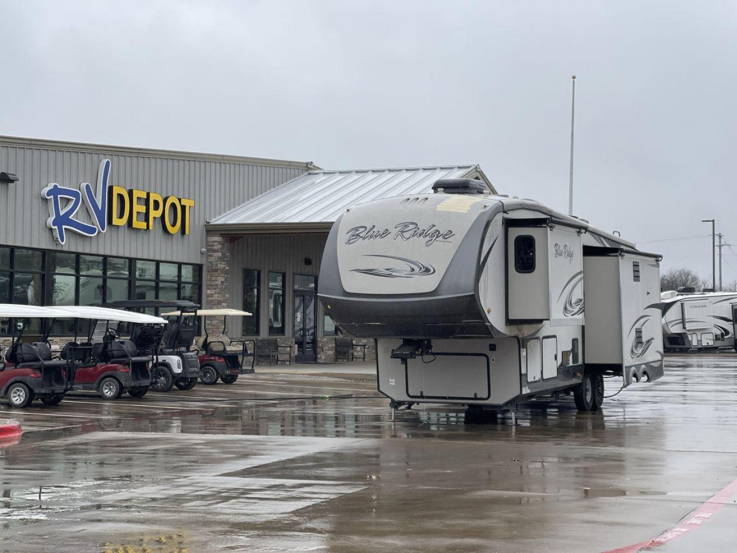 2014 TAN BLUE RIDGE 3025RL (4X4FBLF29EG) , Length: 35.5 ft. | Dry Weight: 11,614 lbs. | Gross Weight: 14,090 lbs. | Slides: 3 transmission, located at 4319 N Main St, Cleburne, TX, 76033, (817) 678-5133, 32.385960, -97.391212 - This 2014 Forest River Fifth Wheel measures 35.5 feet long and just over 8 feet wide with a dry weight of 11,614 lbs. It has a GVWR of 14,090 lbs and a hitch weight of 2,090 lbs. This unit has automatic heating and cooling rated at 35,000 and 15,000 BTUs, respectively. The exterior of this unit is a - Photo#0