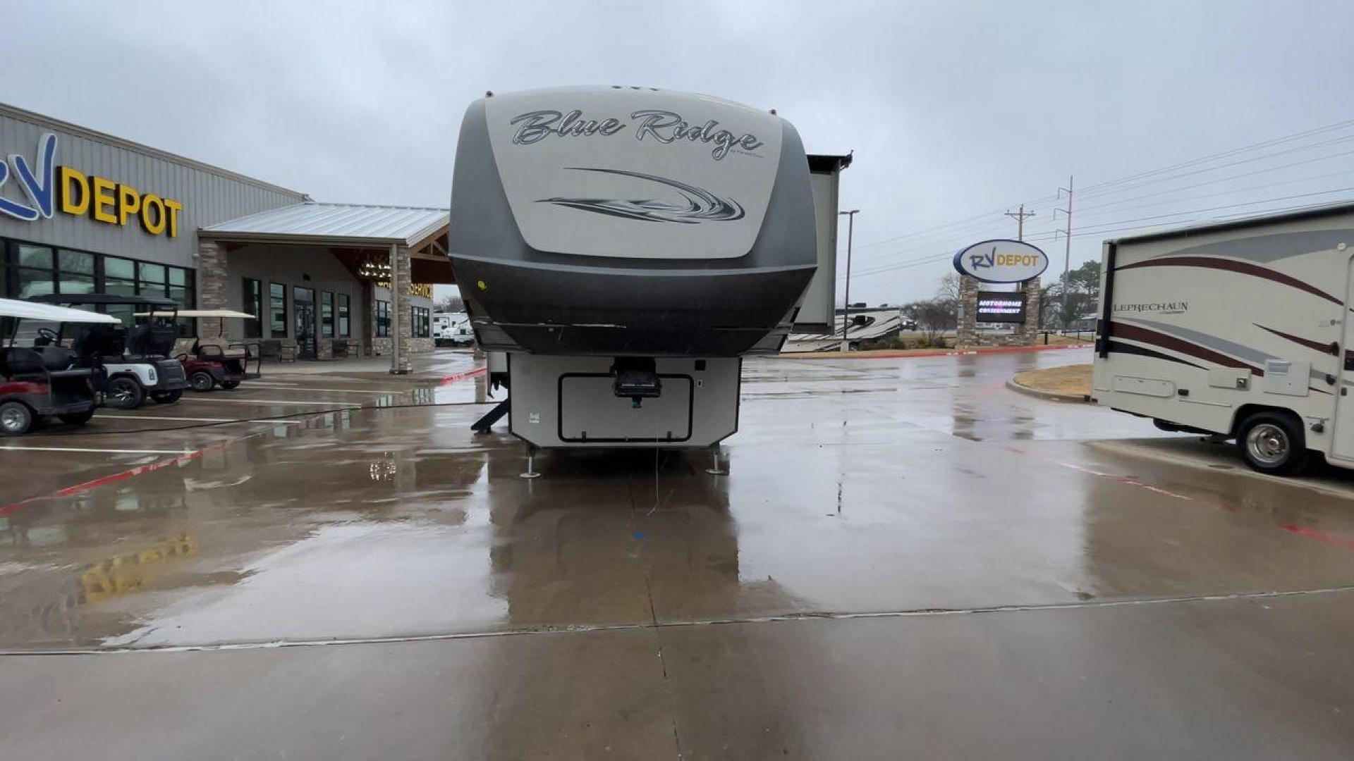 2014 TAN BLUE RIDGE 3025RL (4X4FBLF29EG) , Length: 35.5 ft. | Dry Weight: 11,614 lbs. | Gross Weight: 14,090 lbs. | Slides: 3 transmission, located at 4319 N Main St, Cleburne, TX, 76033, (817) 678-5133, 32.385960, -97.391212 - This 2014 Forest River Fifth Wheel measures 35.5 feet long and just over 8 feet wide with a dry weight of 11,614 lbs. It has a GVWR of 14,090 lbs and a hitch weight of 2,090 lbs. This unit has automatic heating and cooling rated at 35,000 and 15,000 BTUs, respectively. The exterior of this unit is a - Photo#4